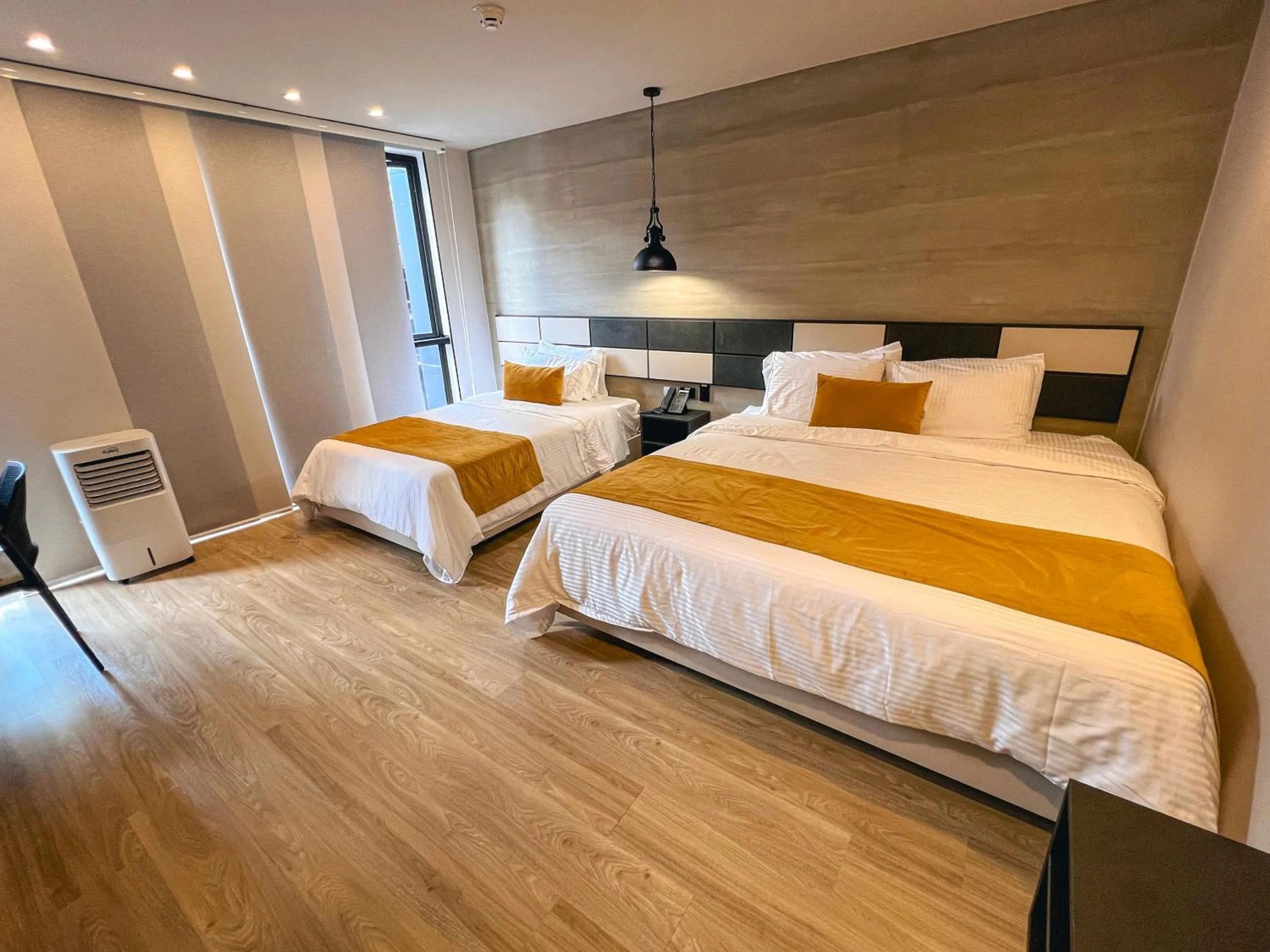 Bed in Balmoral Plaza Hotel