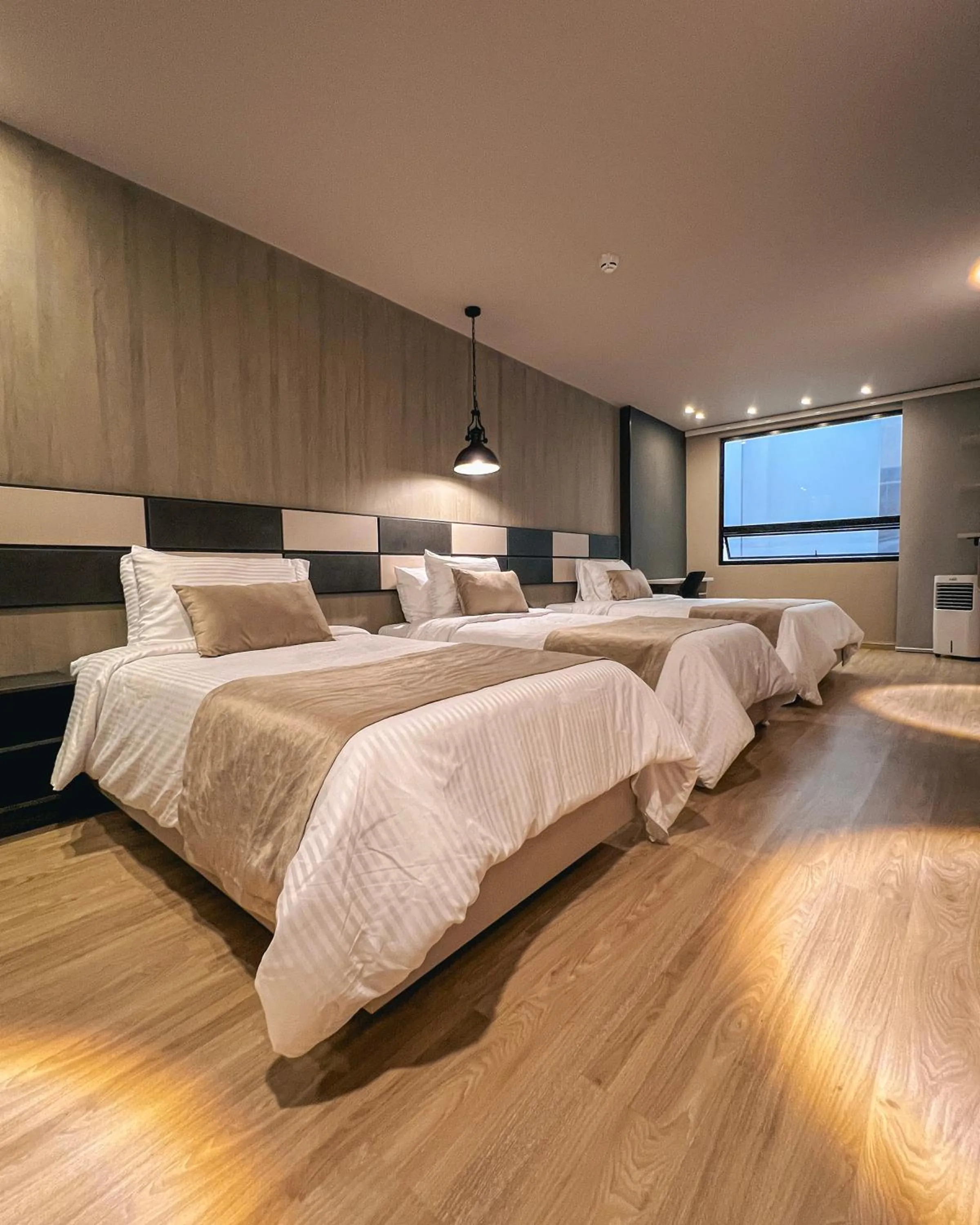 Bed in Balmoral Plaza Hotel