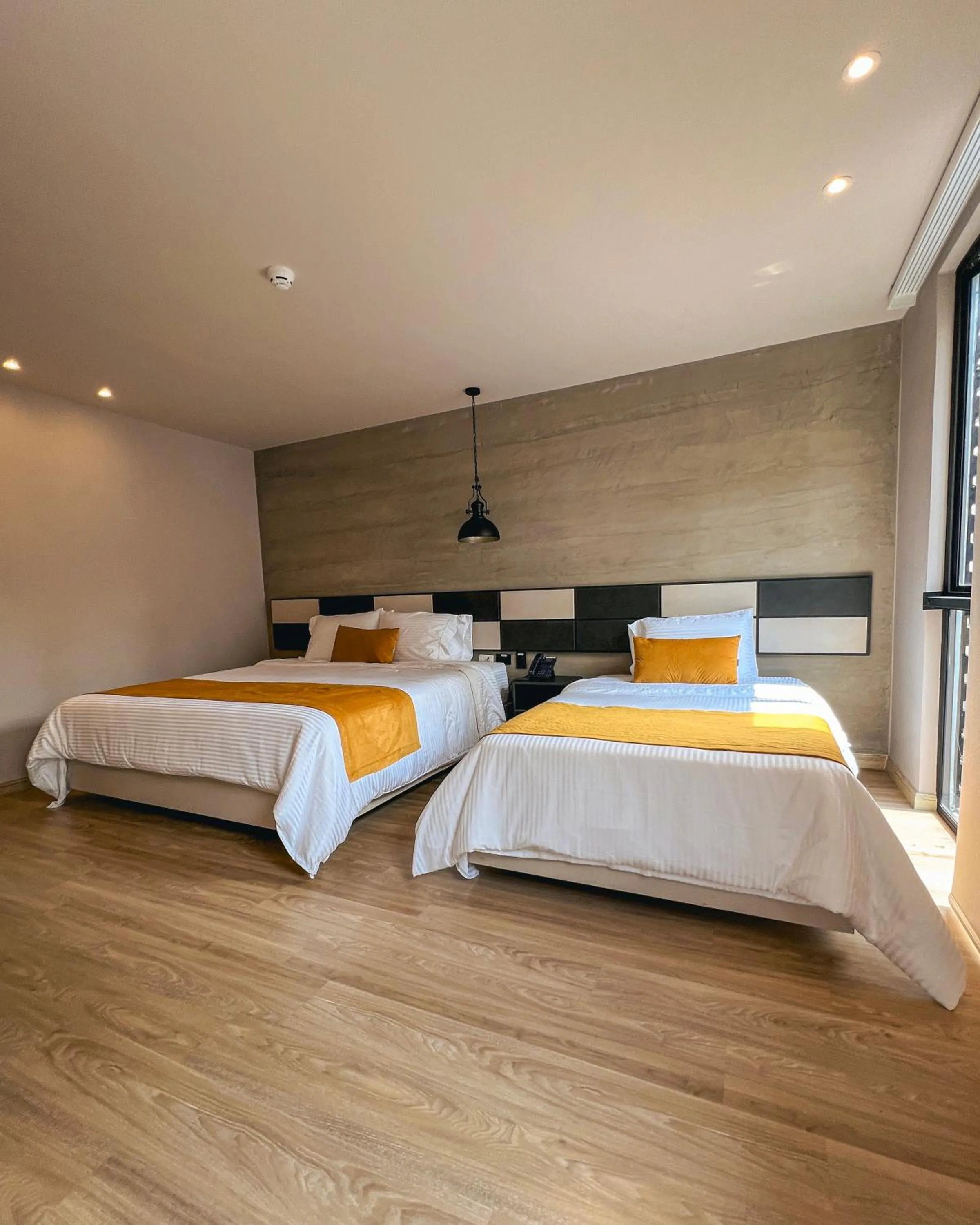 Bed in Balmoral Plaza Hotel