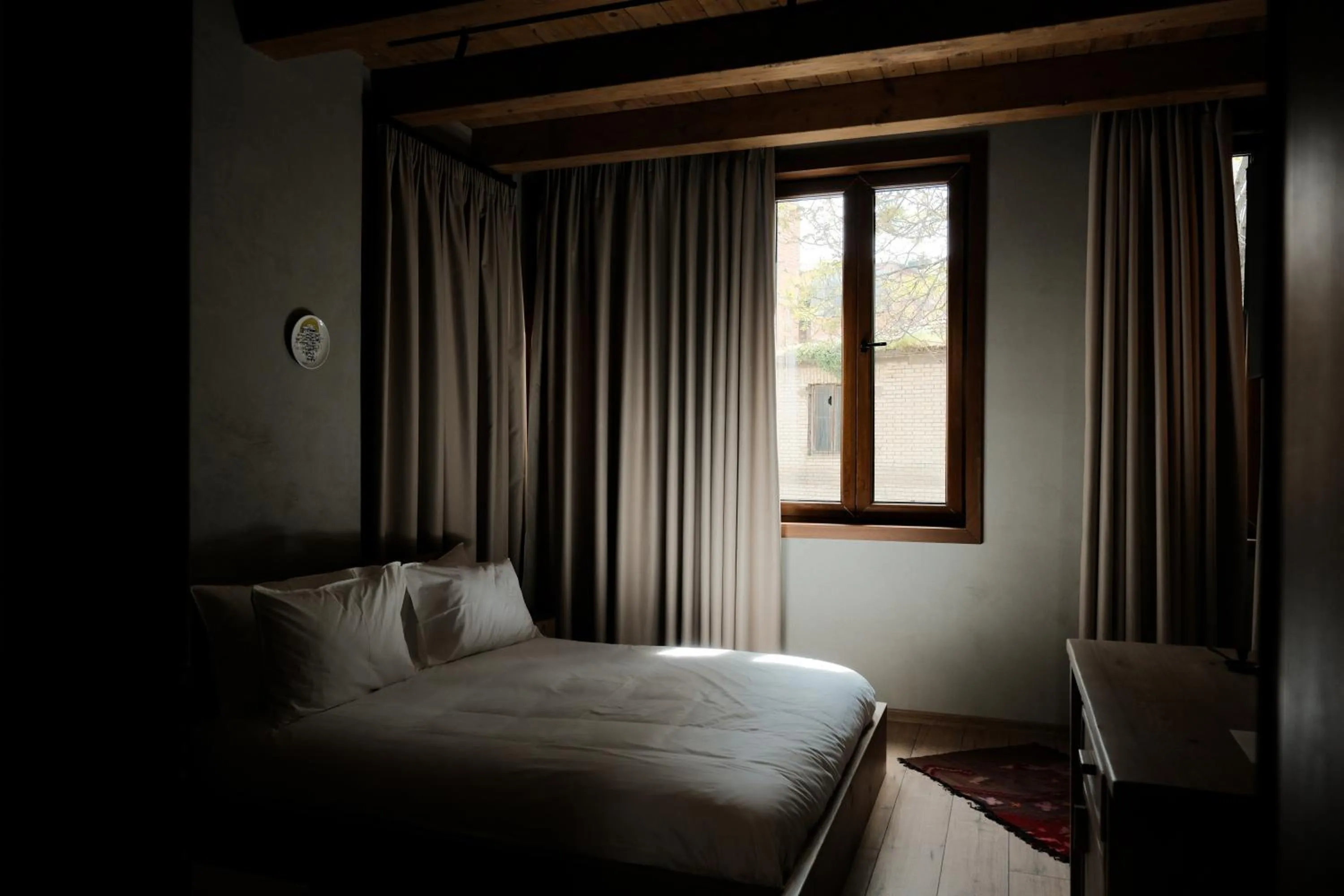 Bed in Faces & Places Boutique Hotel