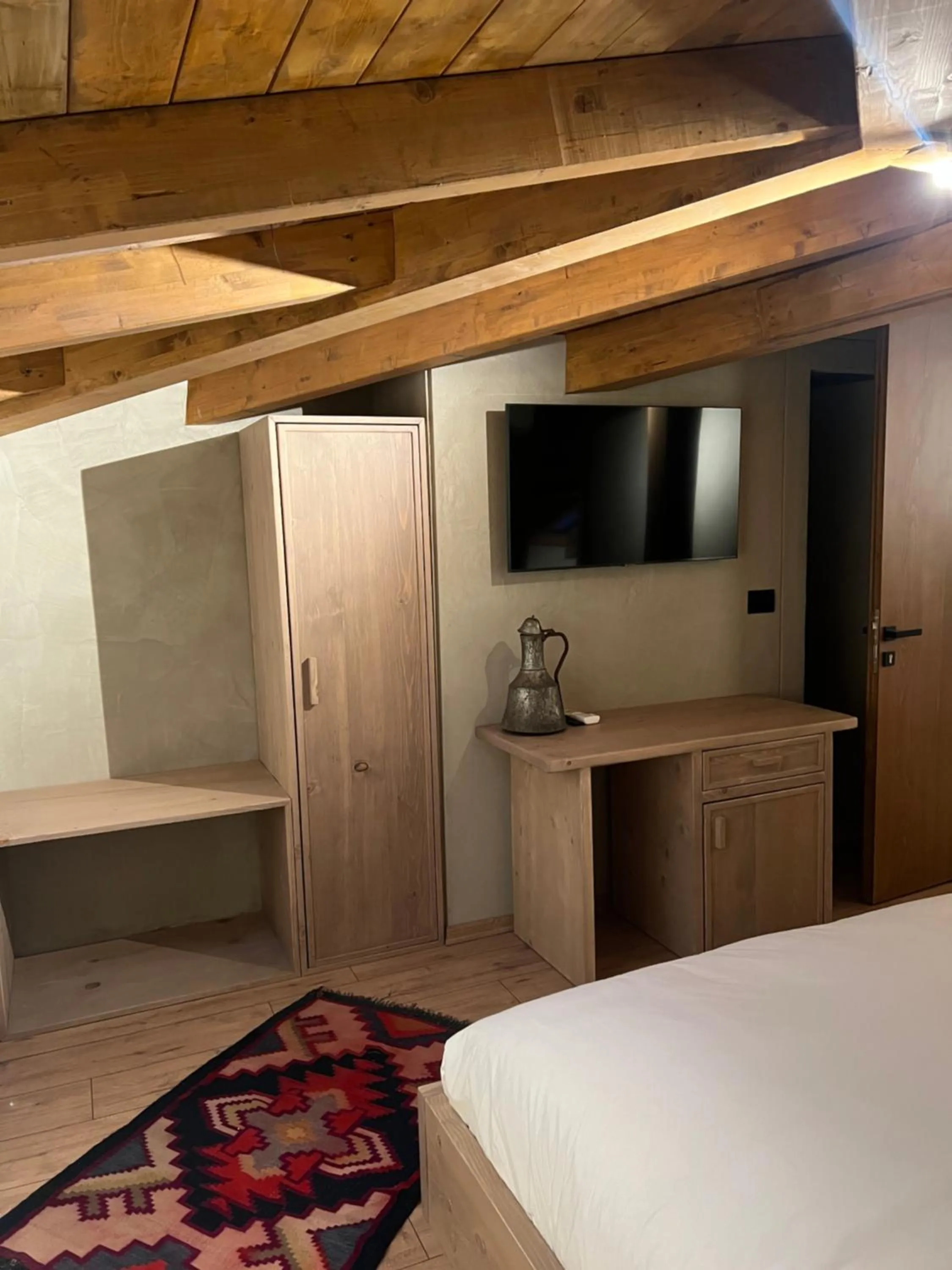 Bed in Faces & Places Boutique Hotel