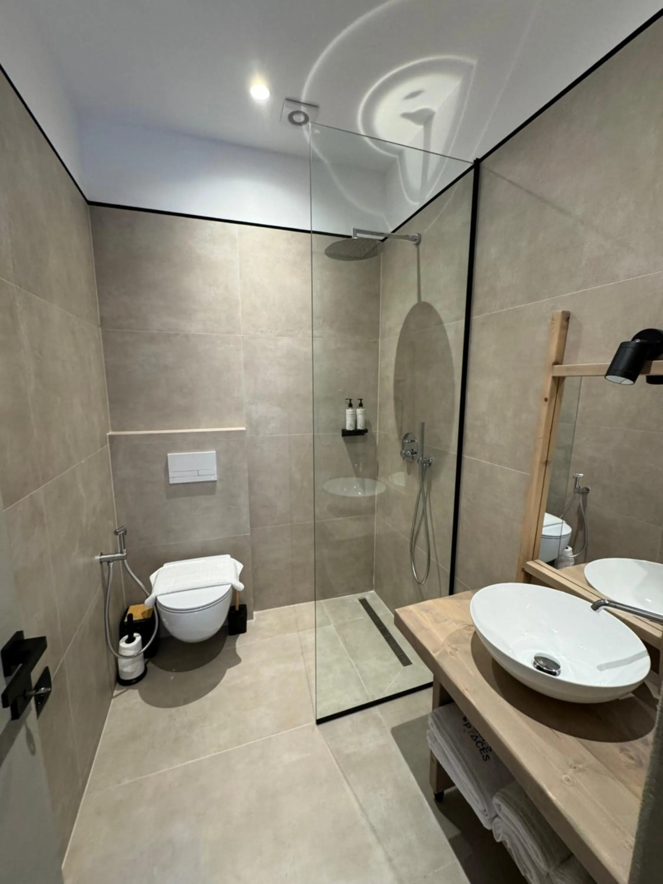 Shower in Faces & Places Boutique Hotel