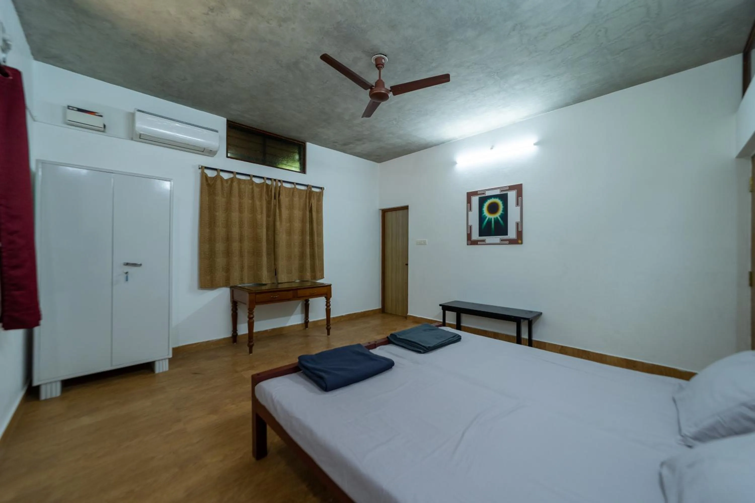 Bedroom in Aurovidya Retreat