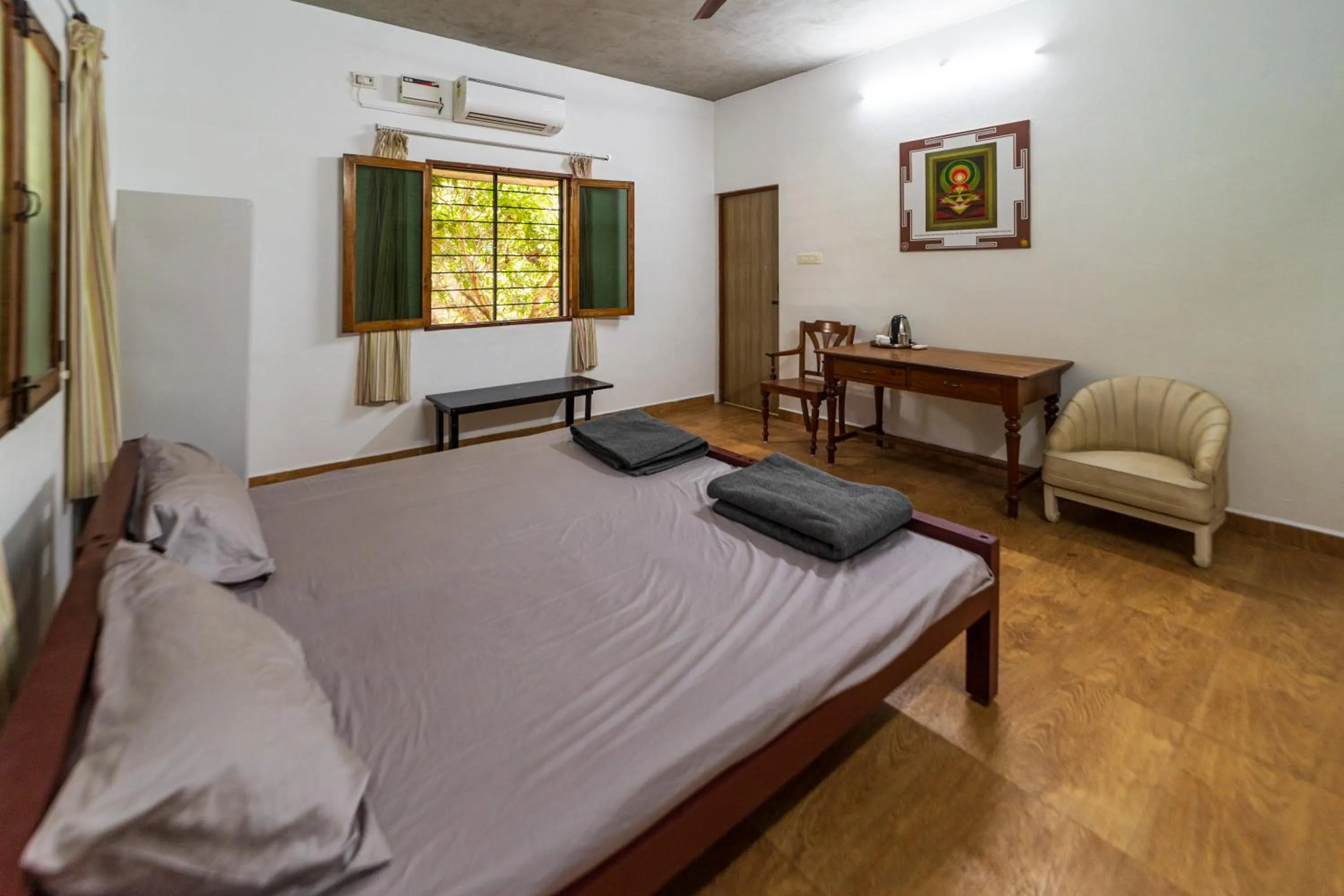 Bedroom in Aurovidya Retreat