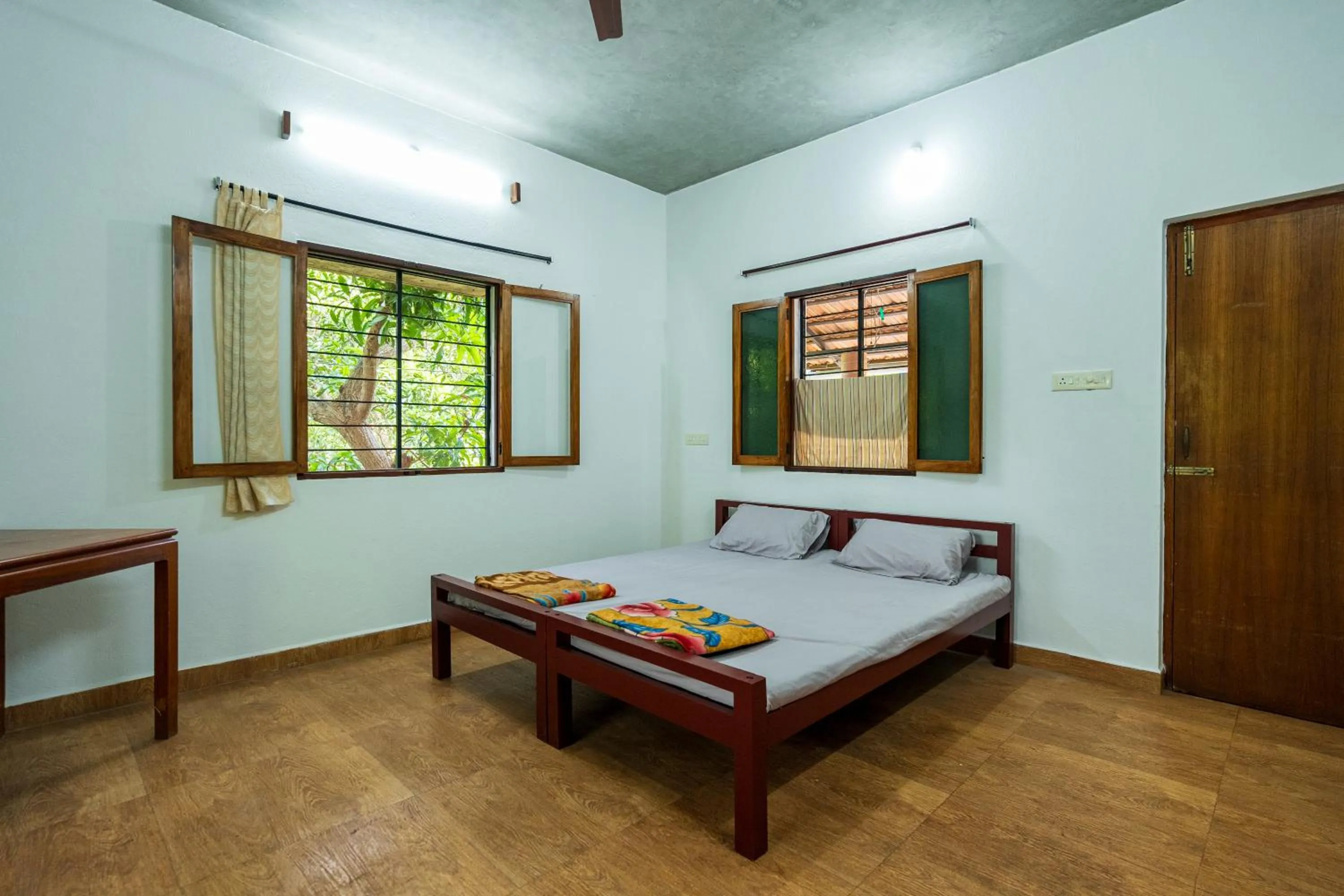 Bed in Aurovidya Retreat