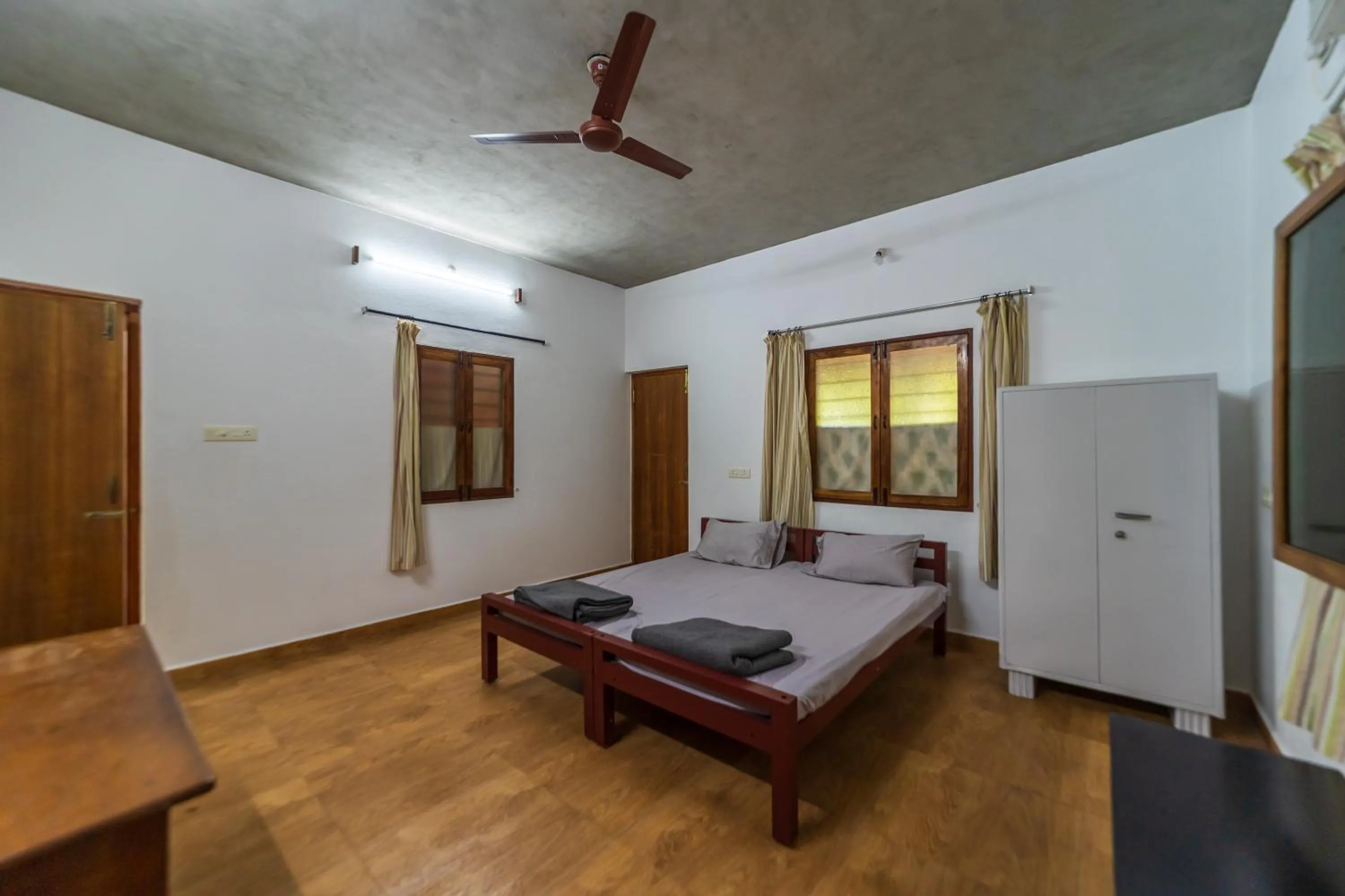 Bed in Aurovidya Retreat