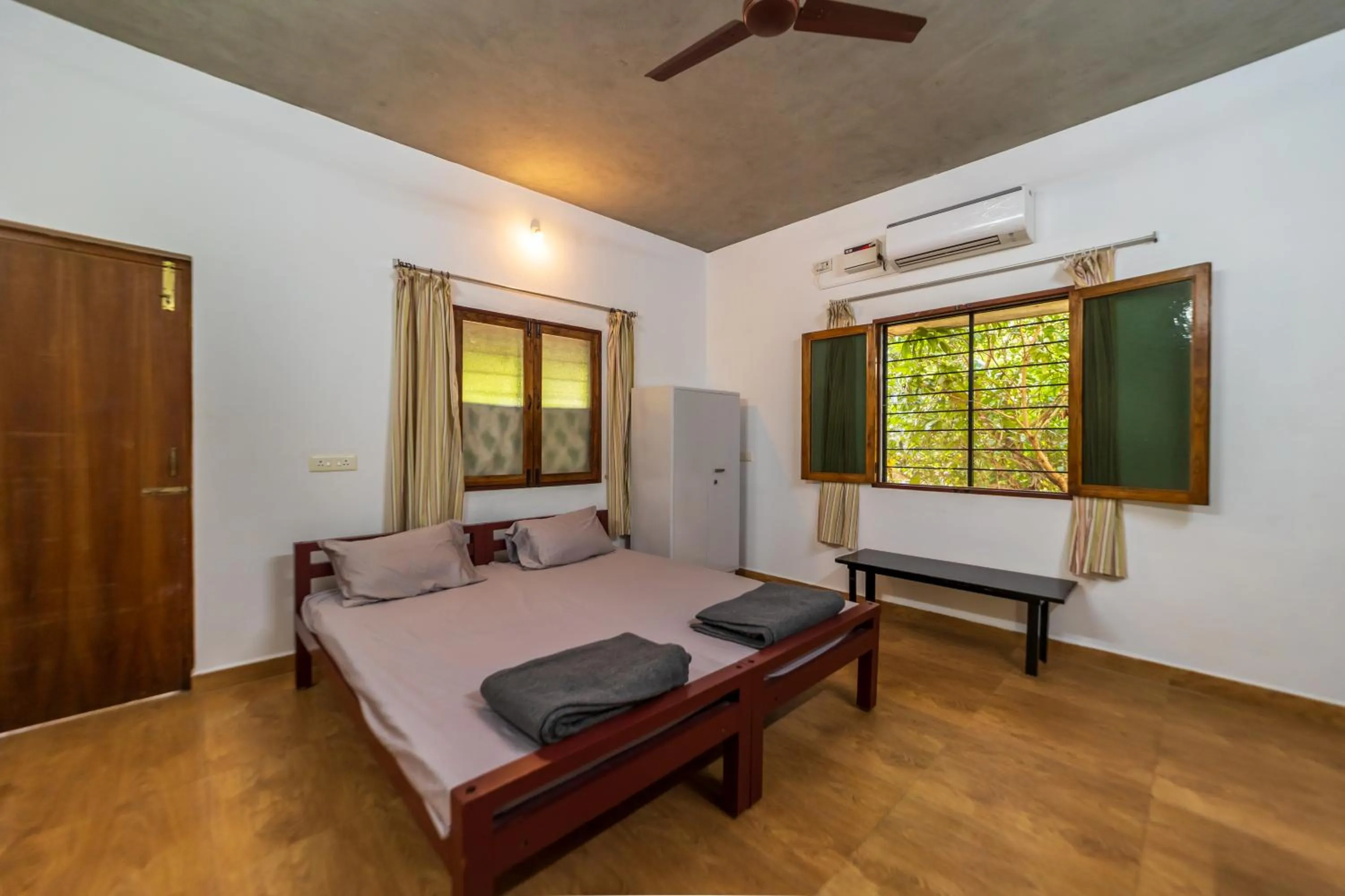 Bed in Aurovidya Retreat