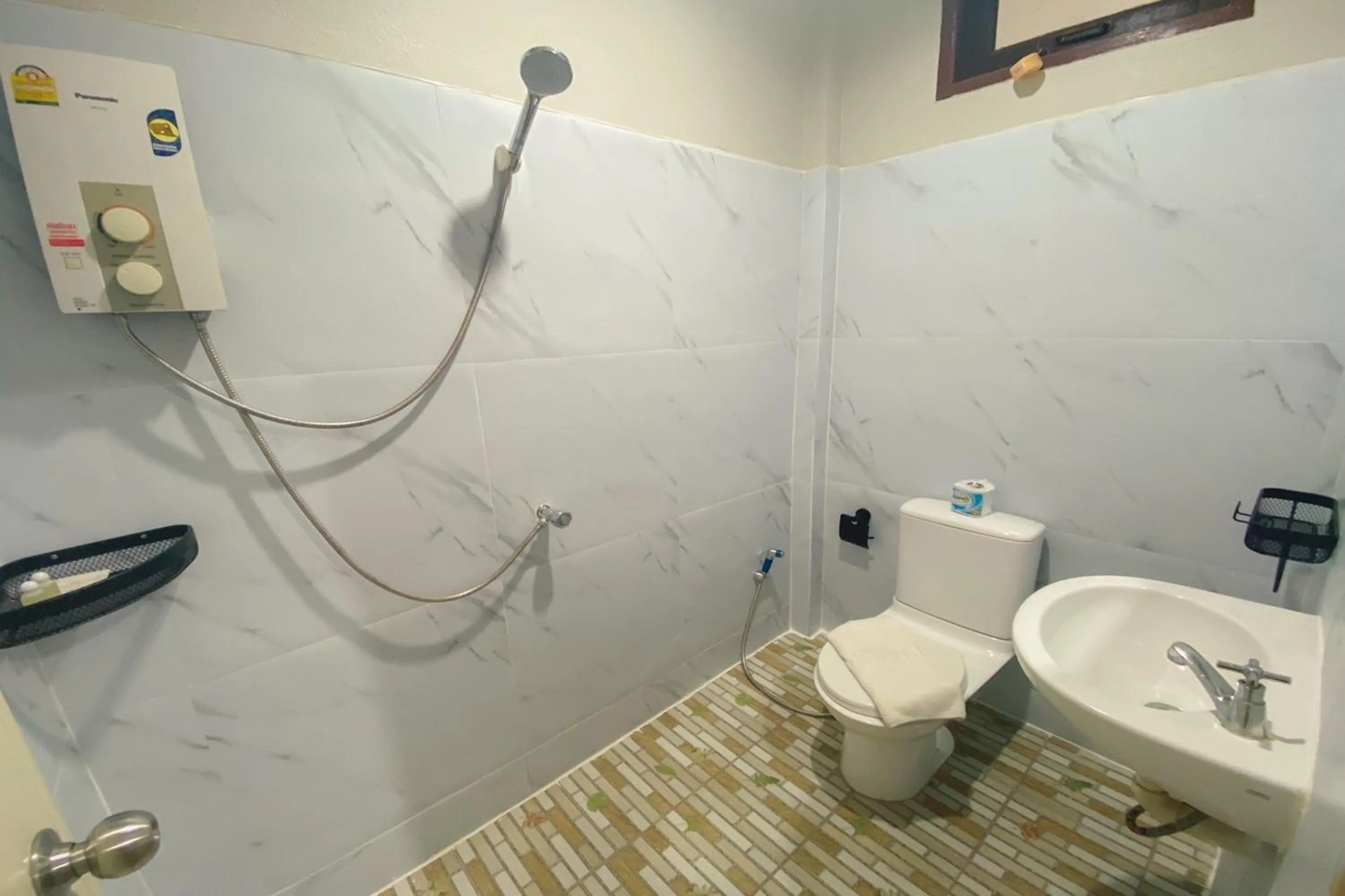 Shower in House No.2 Village