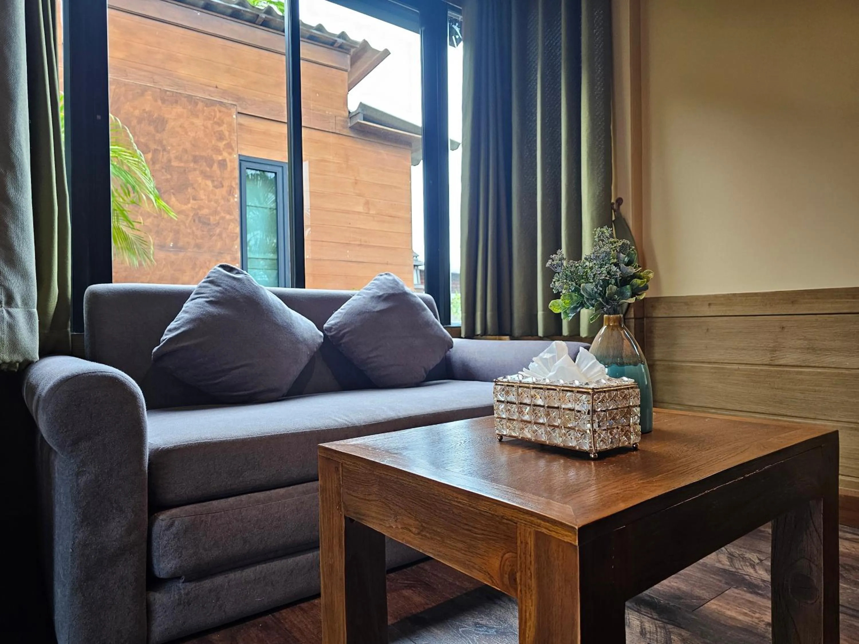 Seating area in R1 Resort Rajapruek Chiangmai