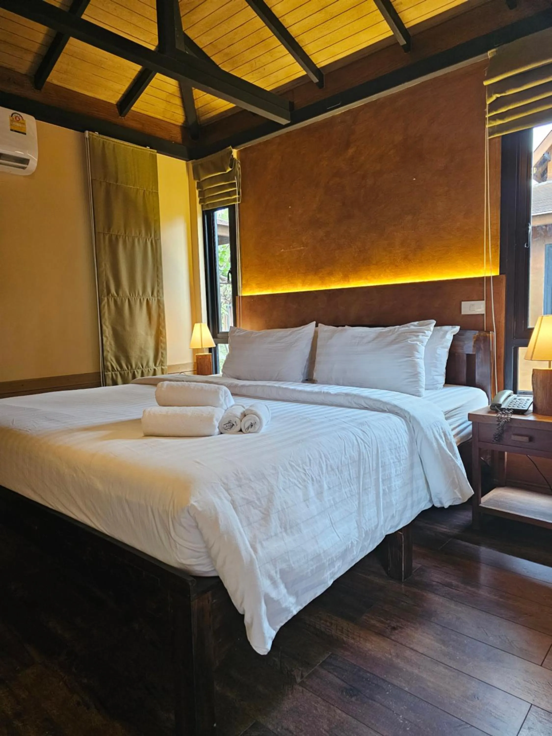 Bed in R1 Resort Rajapruek Chiangmai
