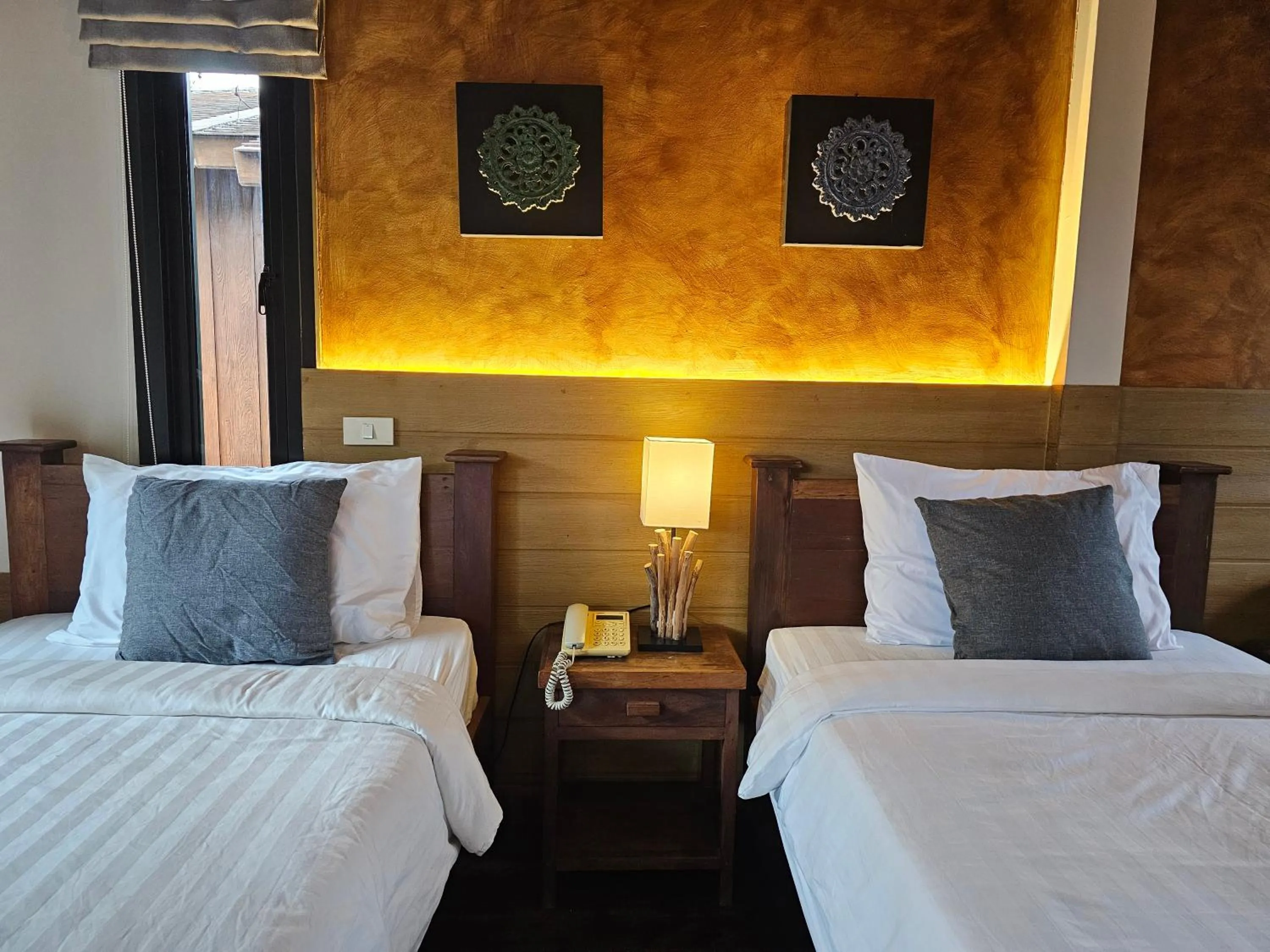 Bed in R1 Resort Rajapruek Chiangmai
