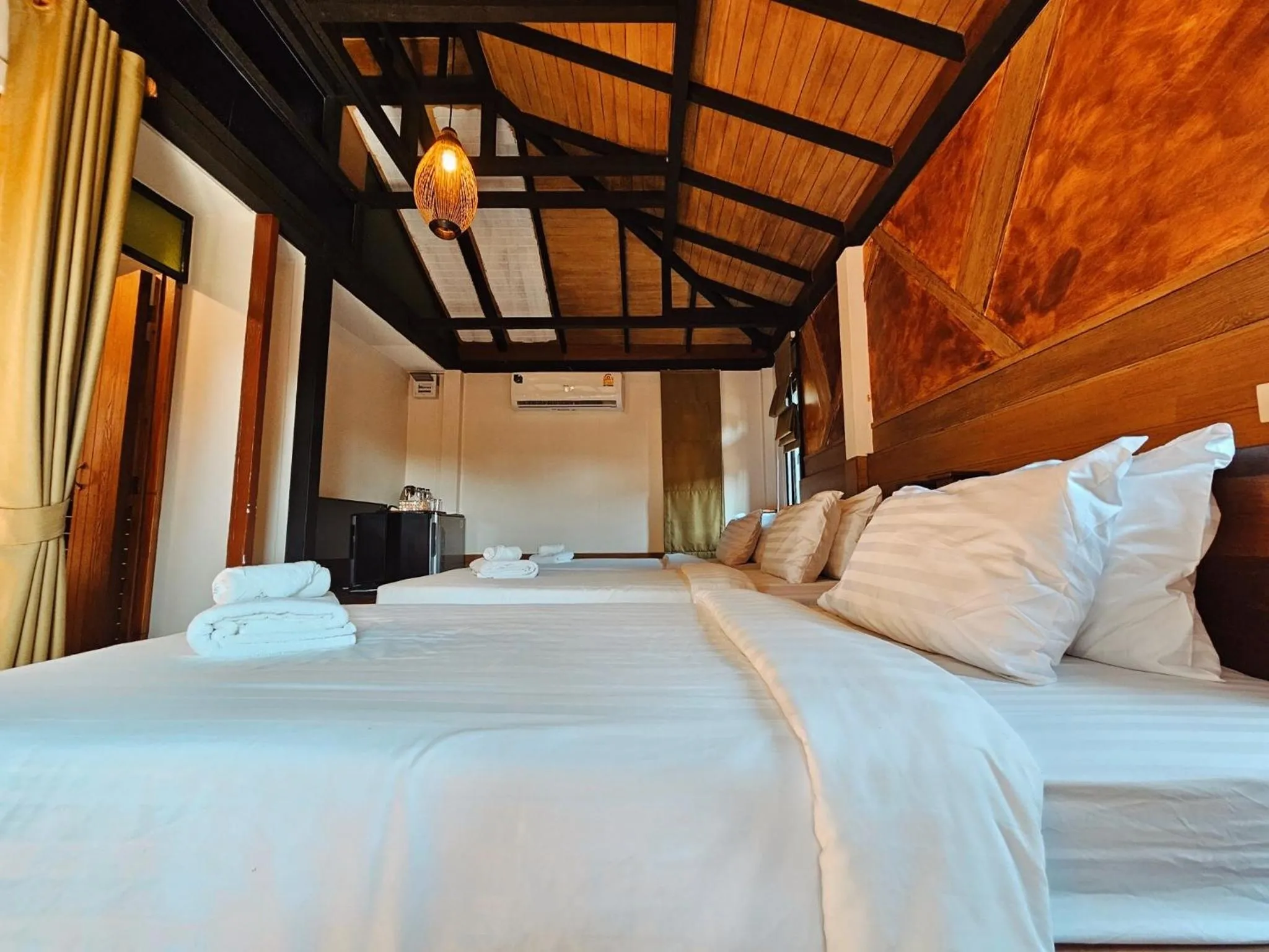 Bed in R1 Resort Rajapruek Chiangmai