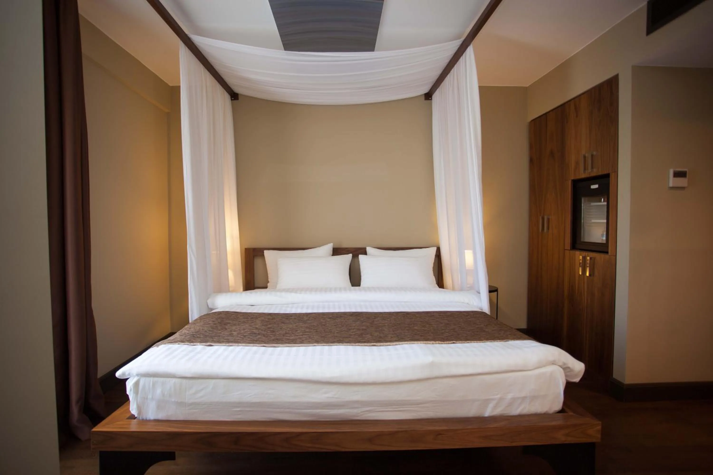 Bed in Juliet Rooms & Kitchen