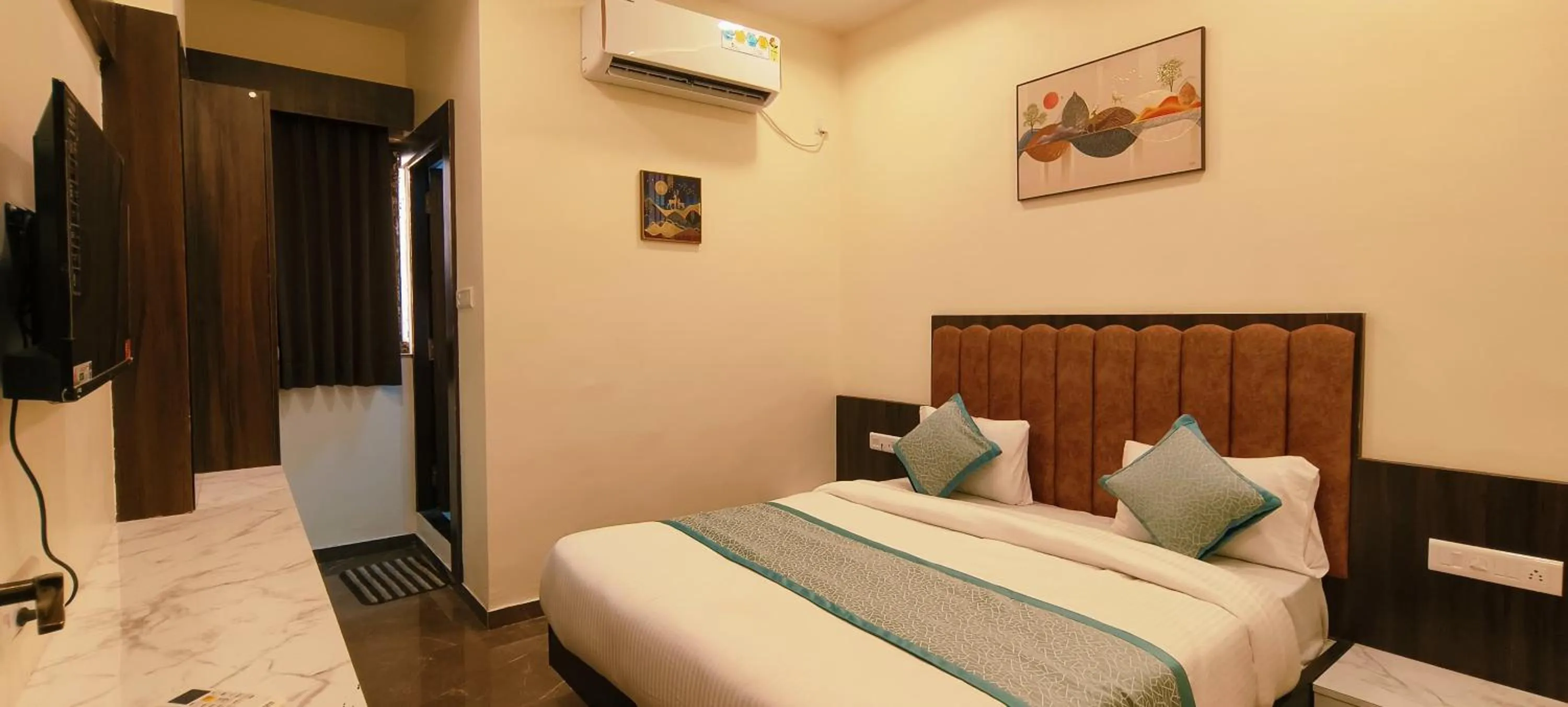 Bed in Hotel Krish villa
