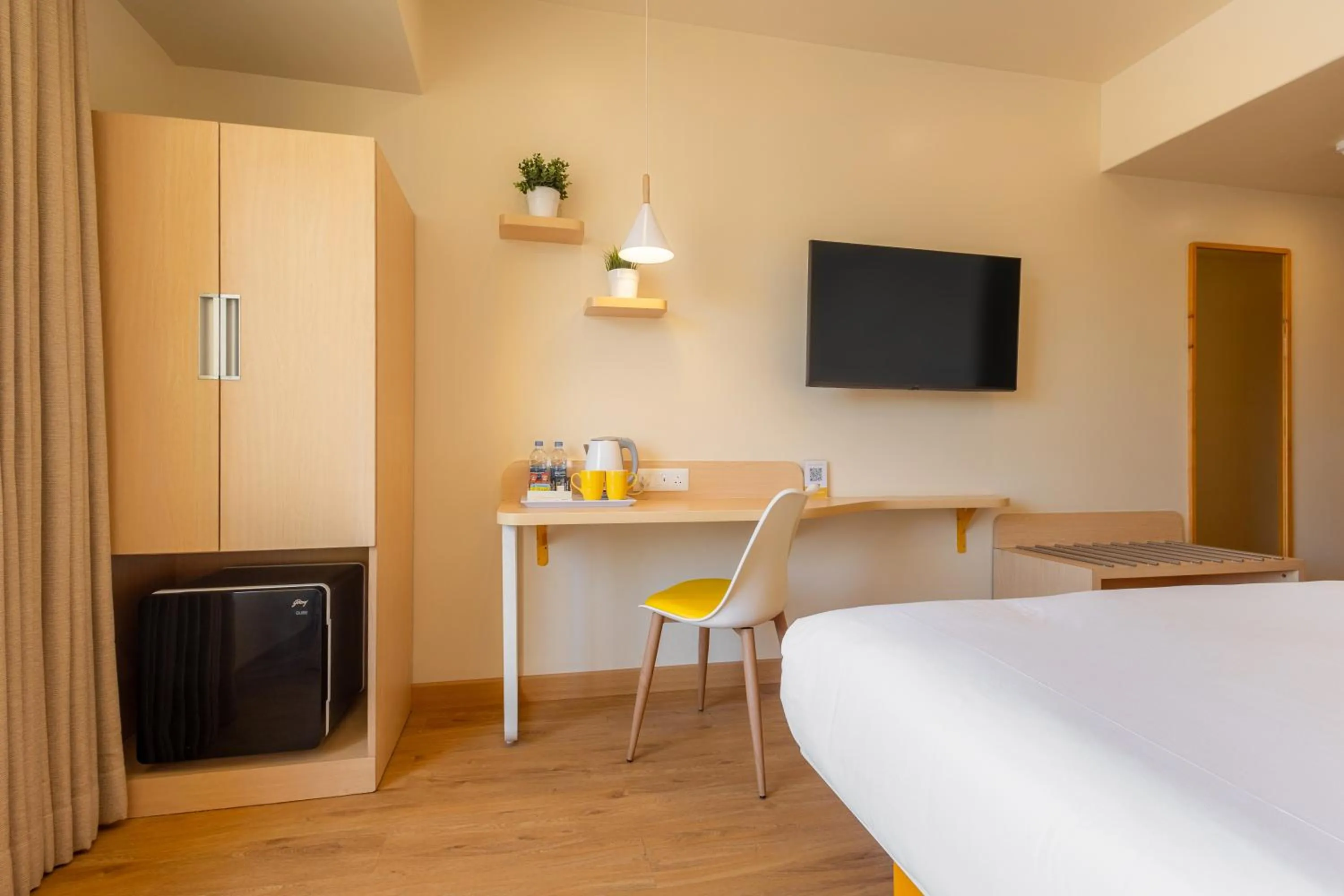 oven, Bed in Bloom Hotel - Ranchi