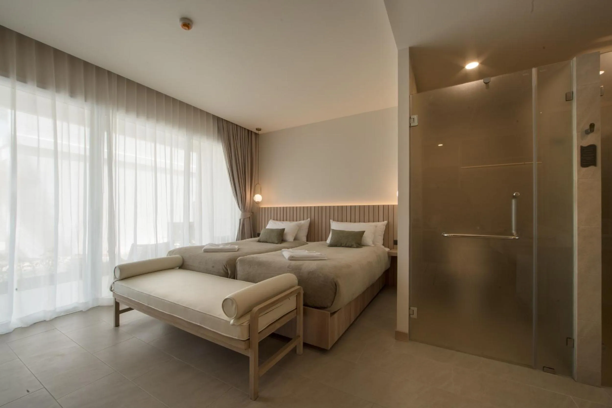 Bed in Niranapa Boutique Resort