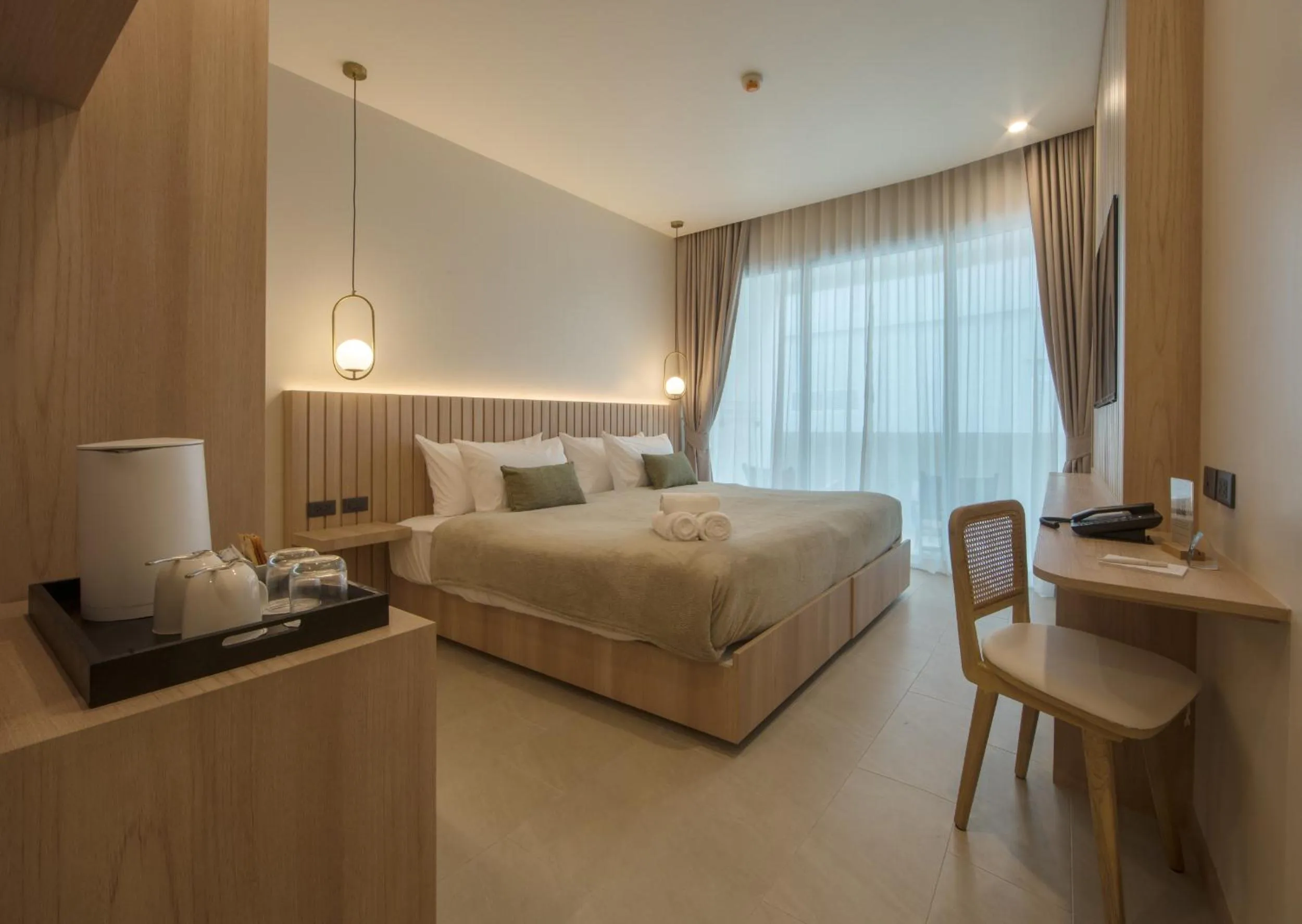 Bed in Niranapa Boutique Resort