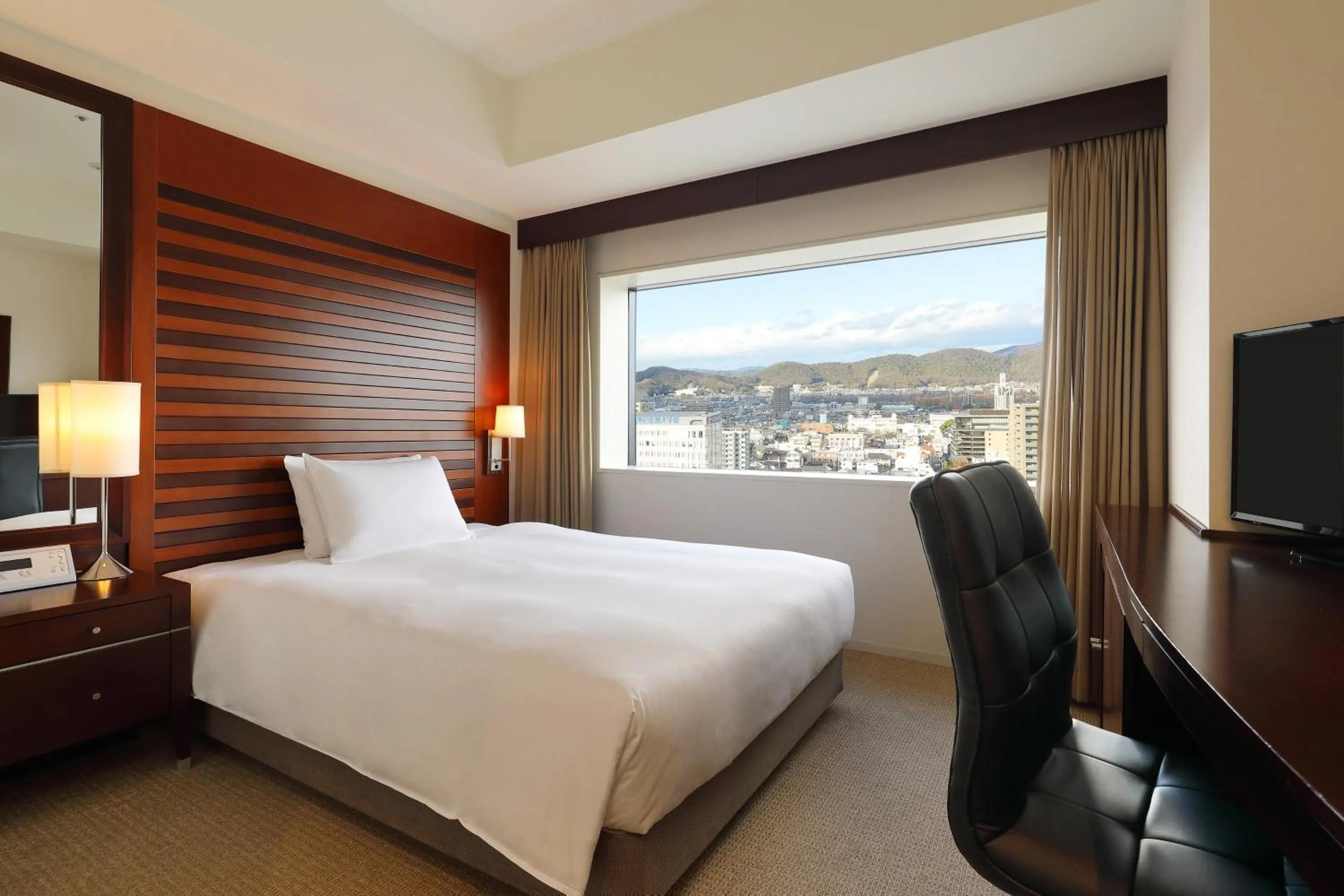 Photo of the whole room, Bed in ANA Crowne Plaza Okayama by IHG