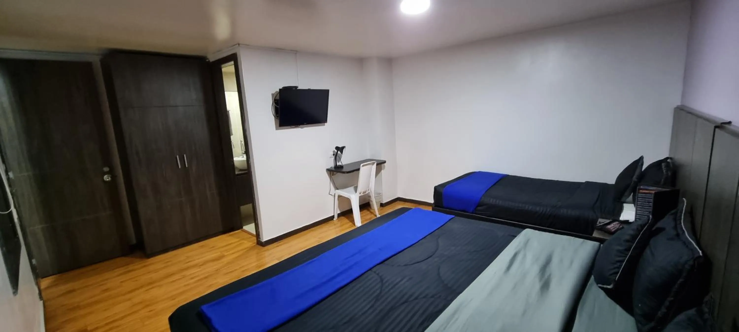 Photo of the whole room, Bed in Stay Blue Hotel