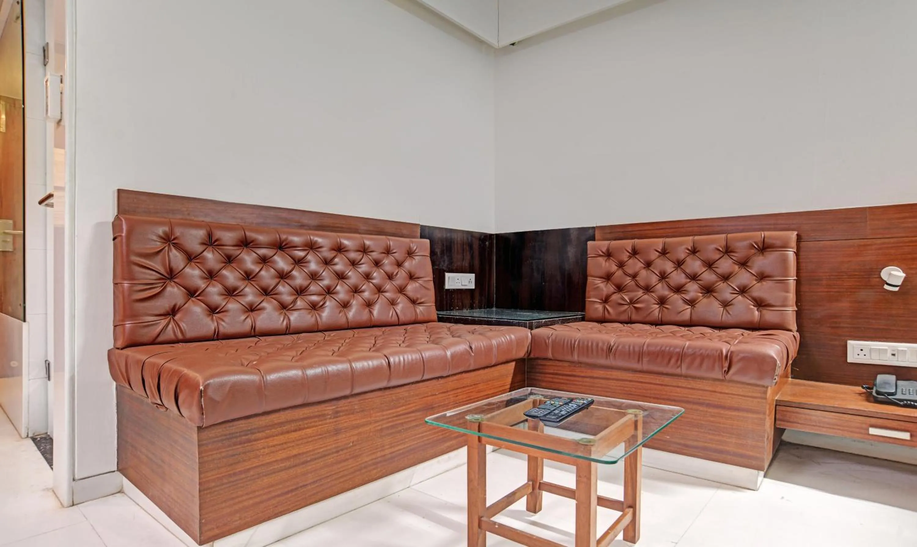 Seating area in Treebo Trend Cherry Tree