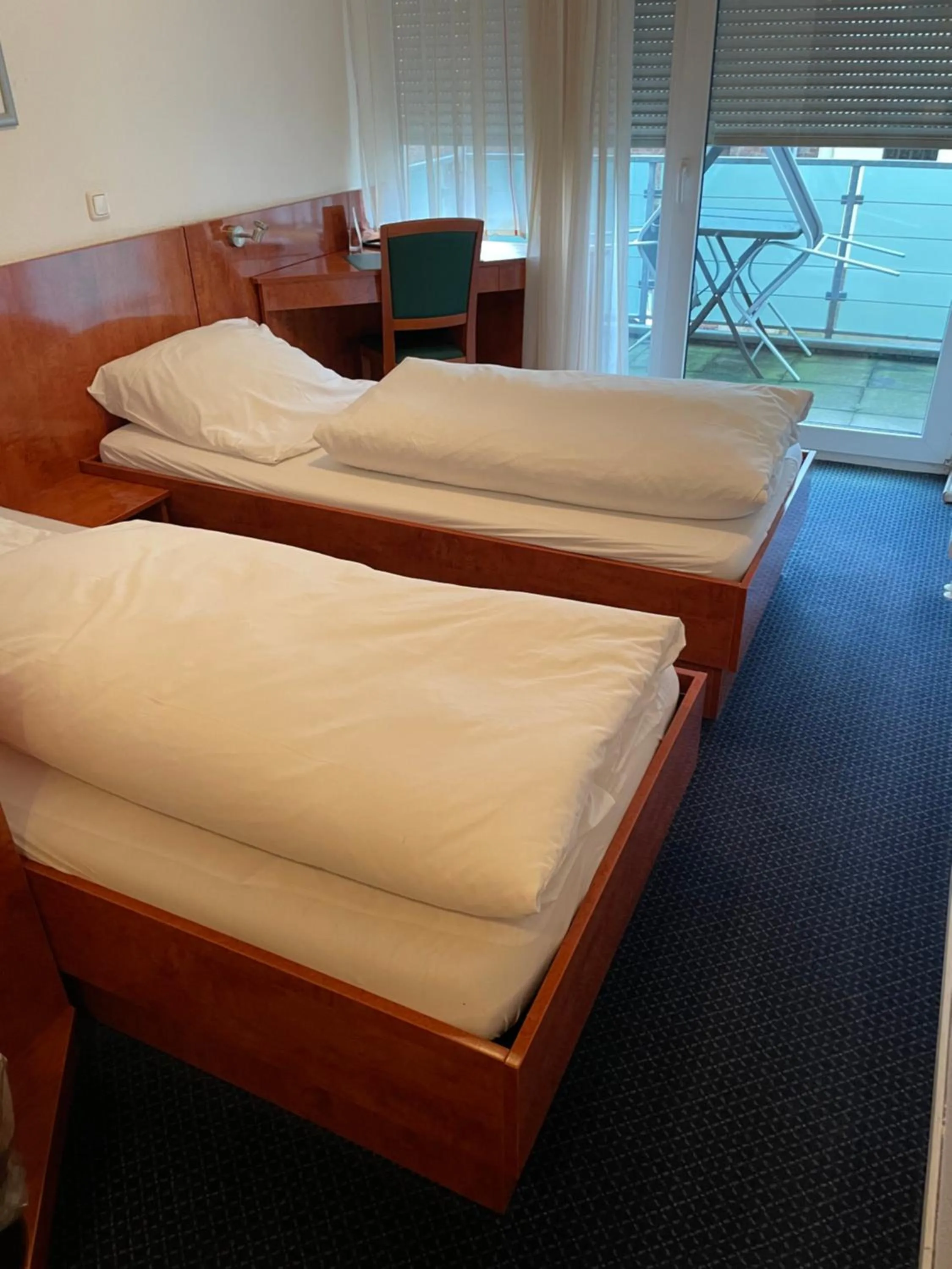 Bed in Hotel Merkenich