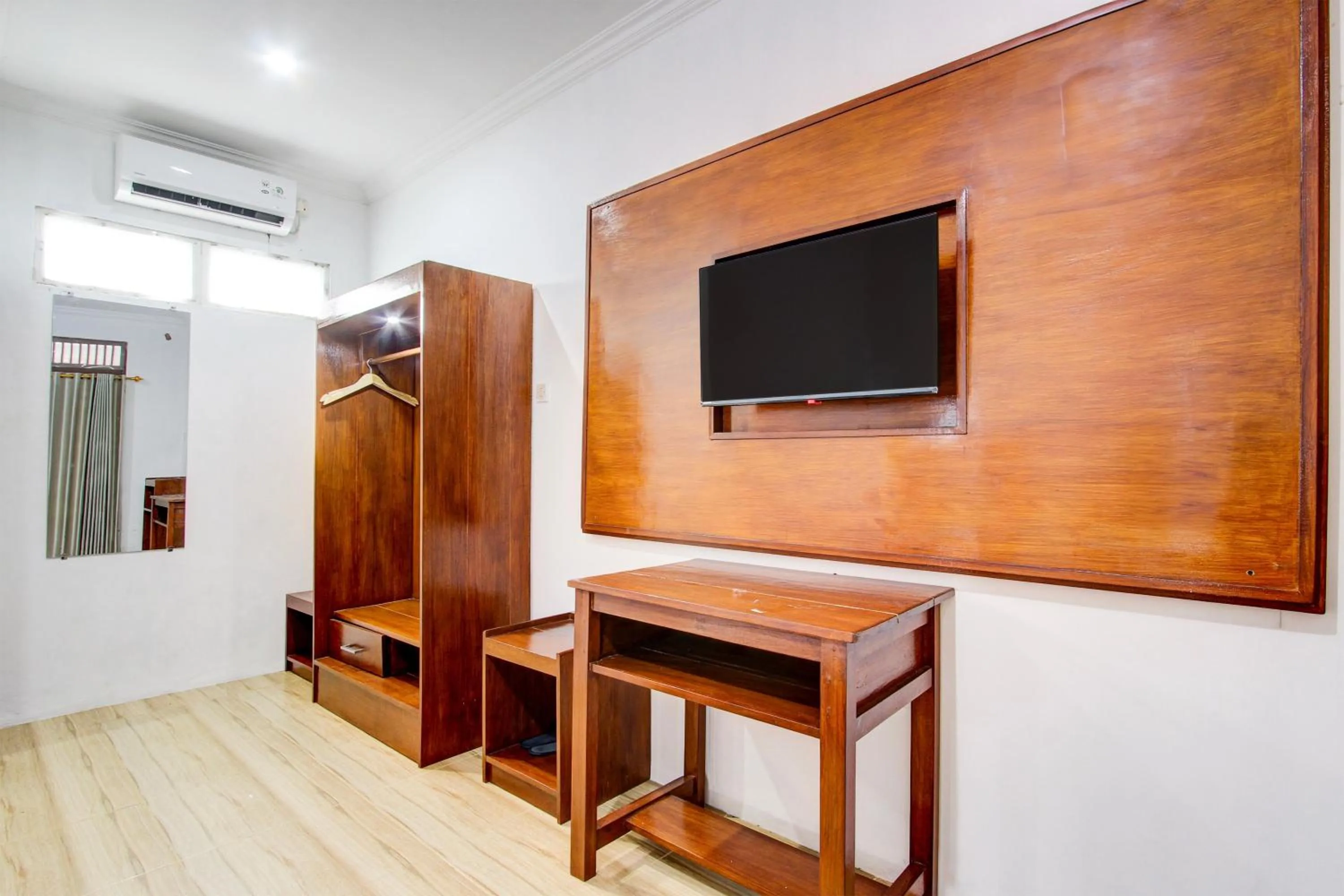 Bedroom in Capital O 93873 Sokkyo Homestay