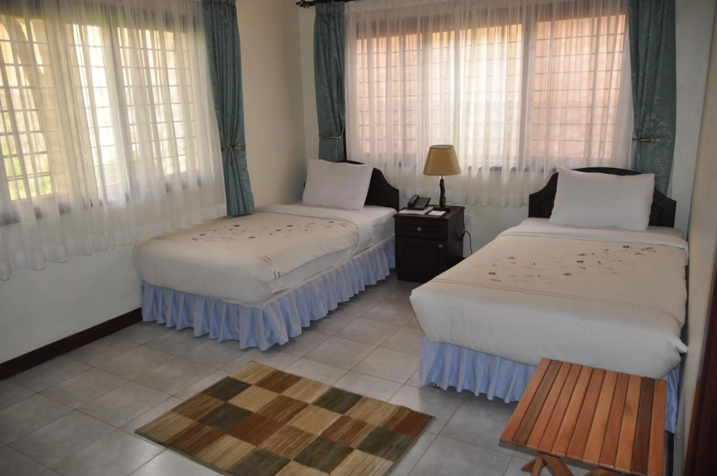 Bedroom, Bed in The Milimani Lodge