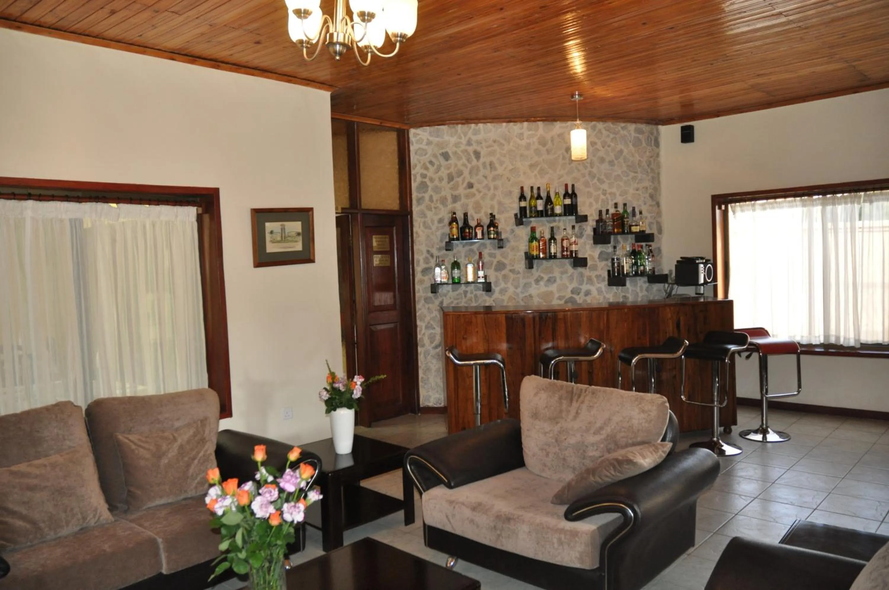 Lounge or bar in The Milimani Lodge