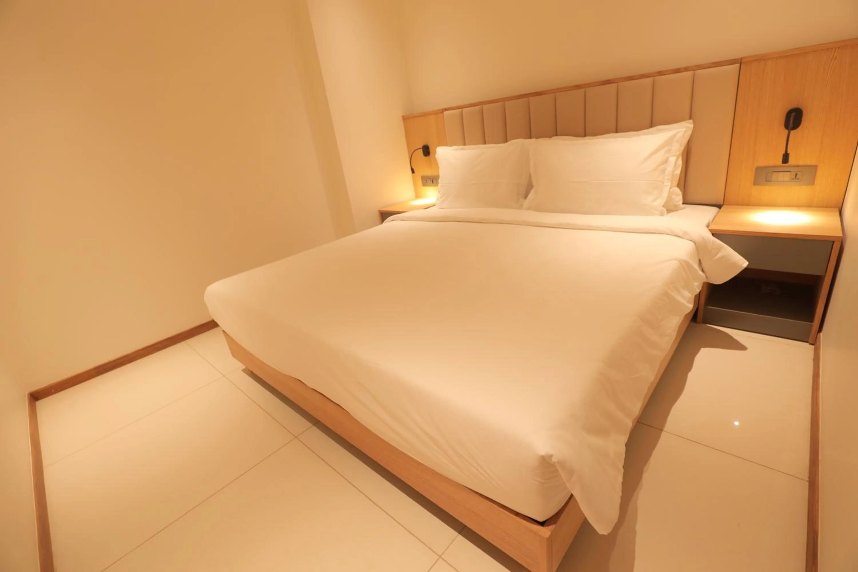 Bed in Regenta - The World Surat