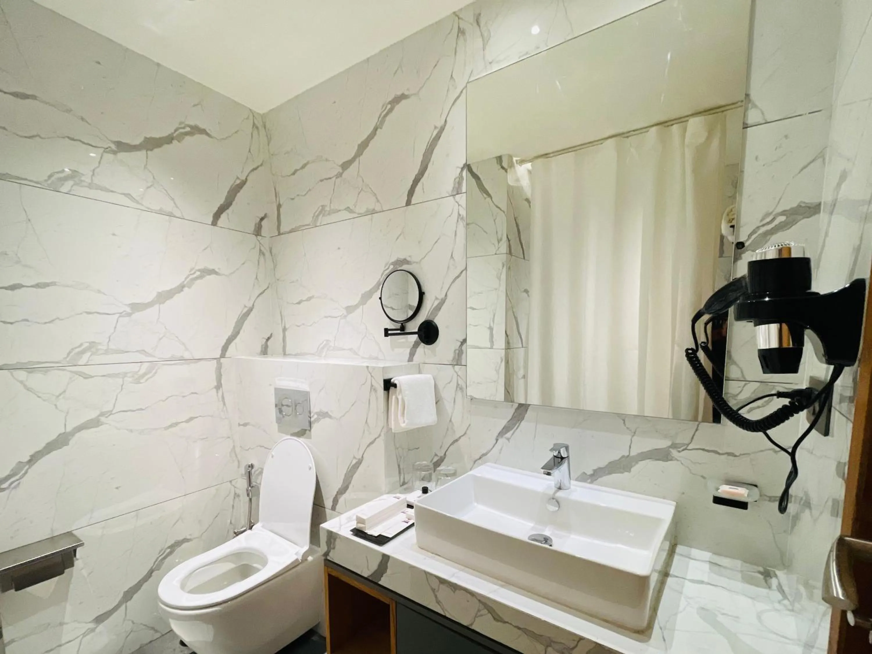 Bathroom in Regenta - The World Surat