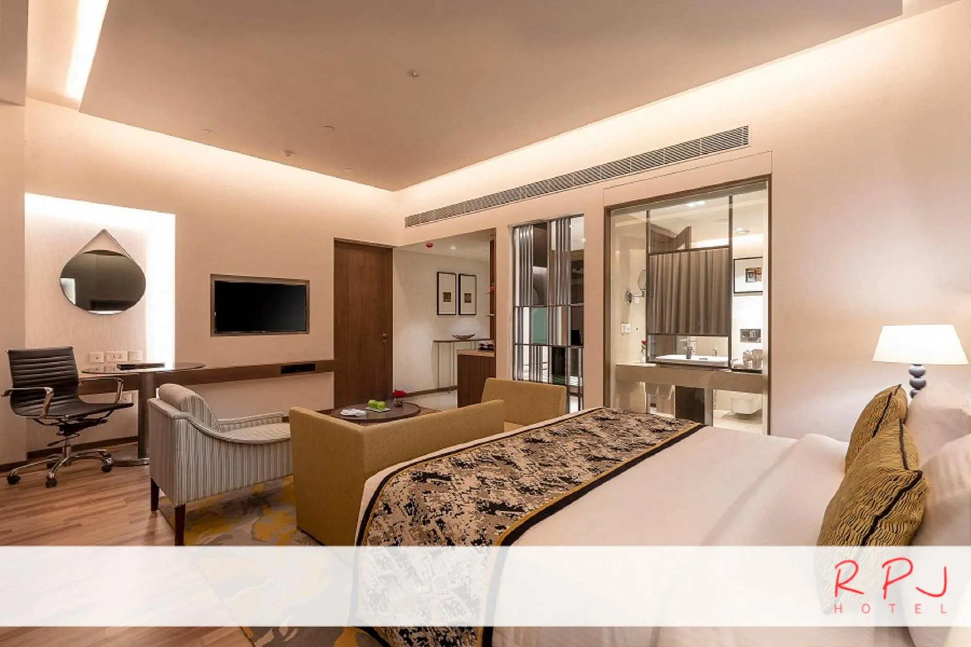 Photo of the whole room, Bed in RPJ Hotel Rajkot