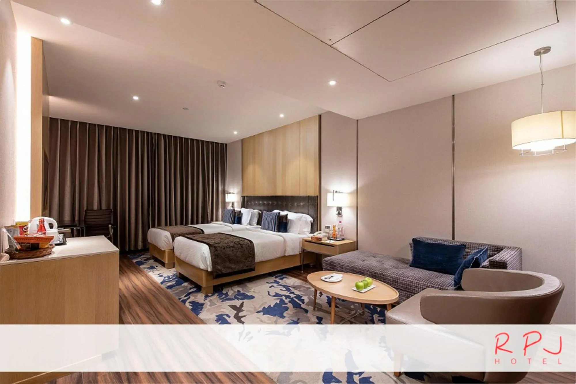 Photo of the whole room, Bed in RPJ Hotel Rajkot