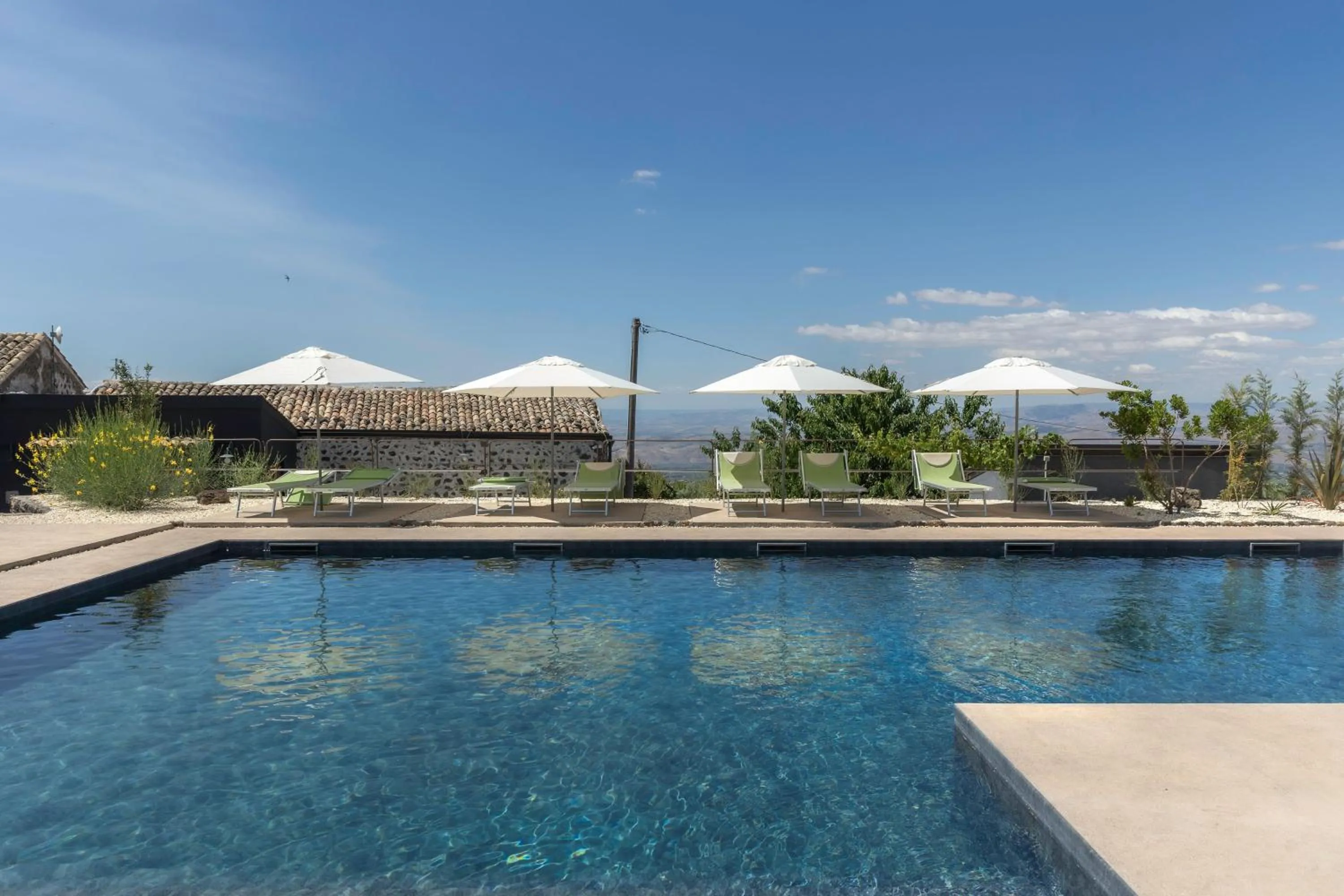 Pool view in PODERE DELL'ETNA SEGRETA - Essential Nature Hotel & Glamping