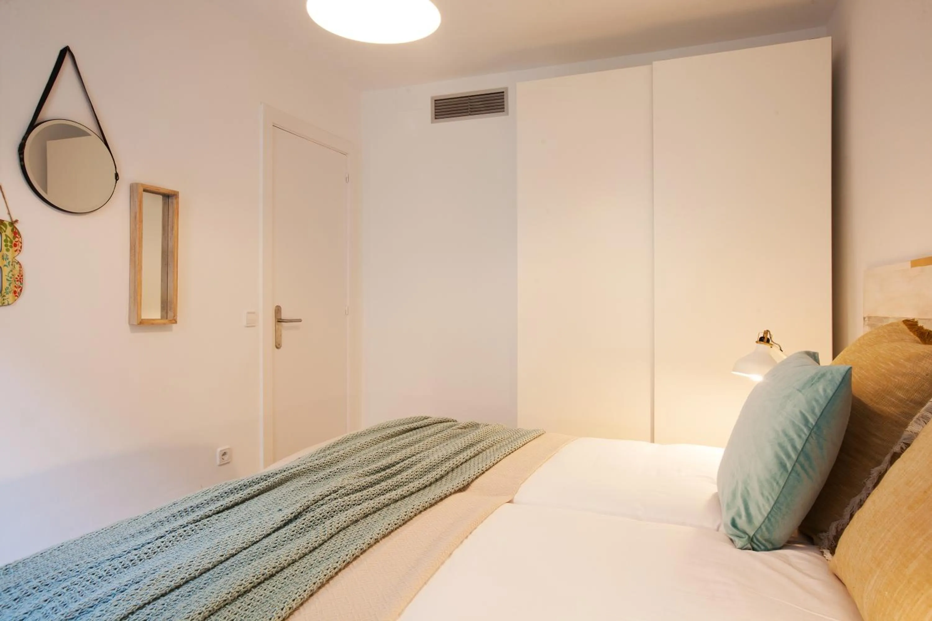 Bed in Click&Flat Seneca Suites