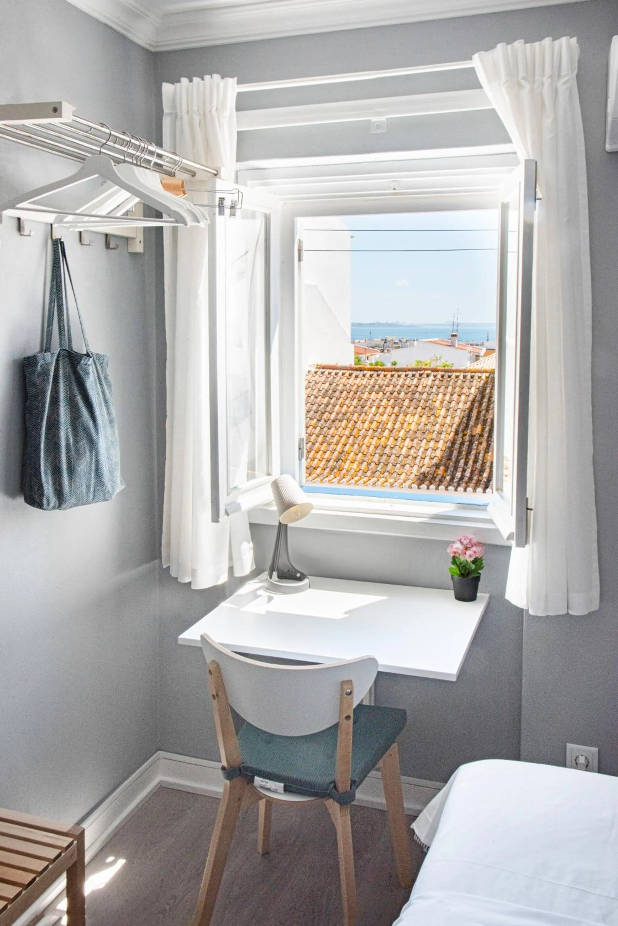 Seating area, Bed in Blue Door Lagos