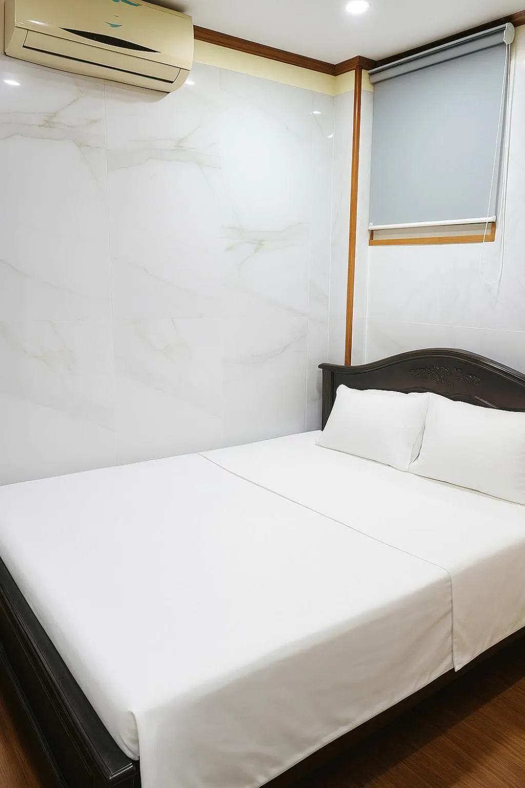 Bed in TUAN Central Hotel