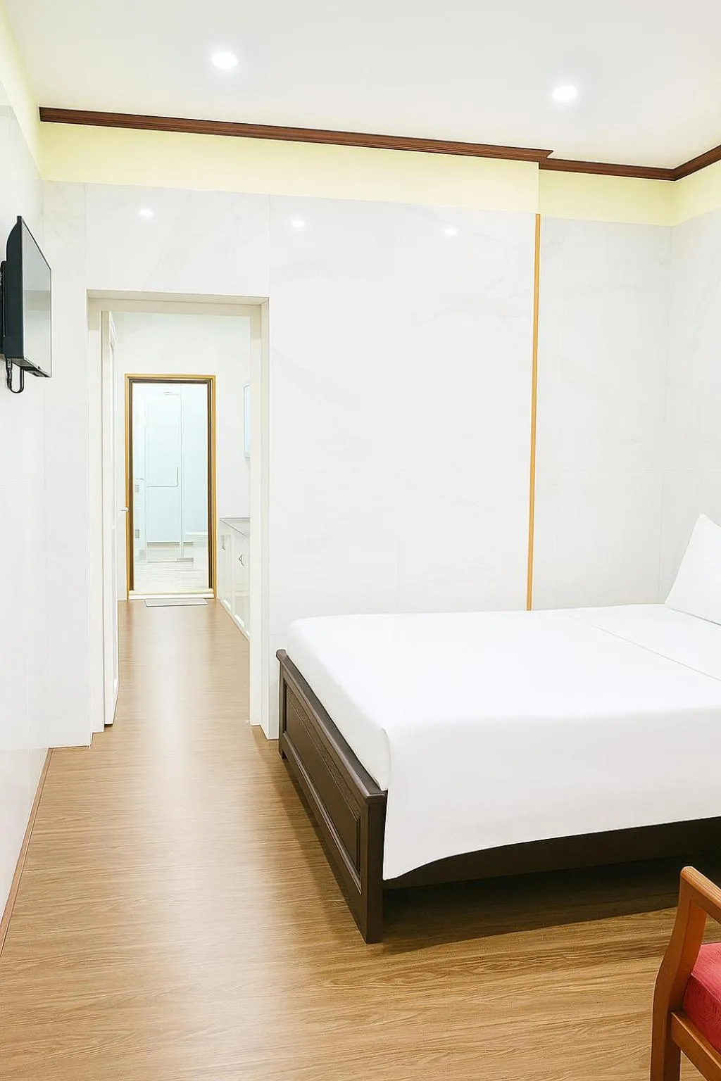 Bed in TUAN Central Hotel