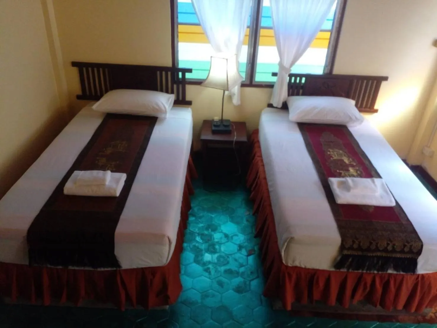 Bed in Golden Triangle Palace Hotel