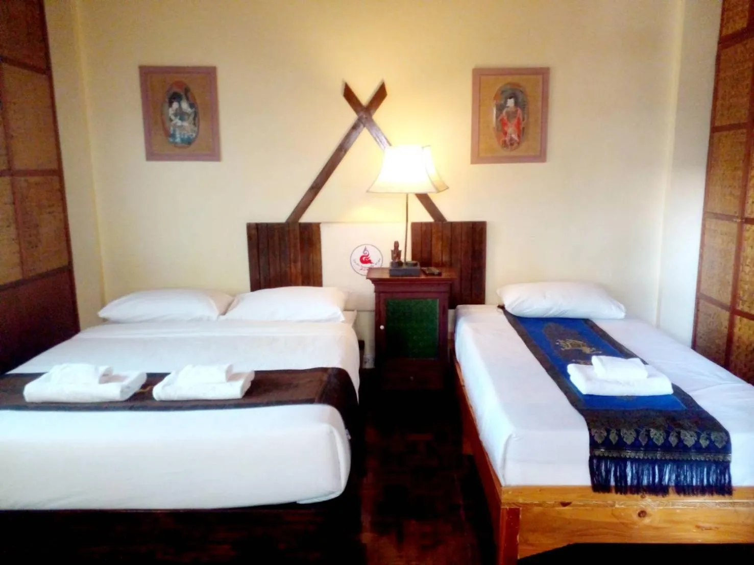 Bed in Golden Triangle Palace Hotel