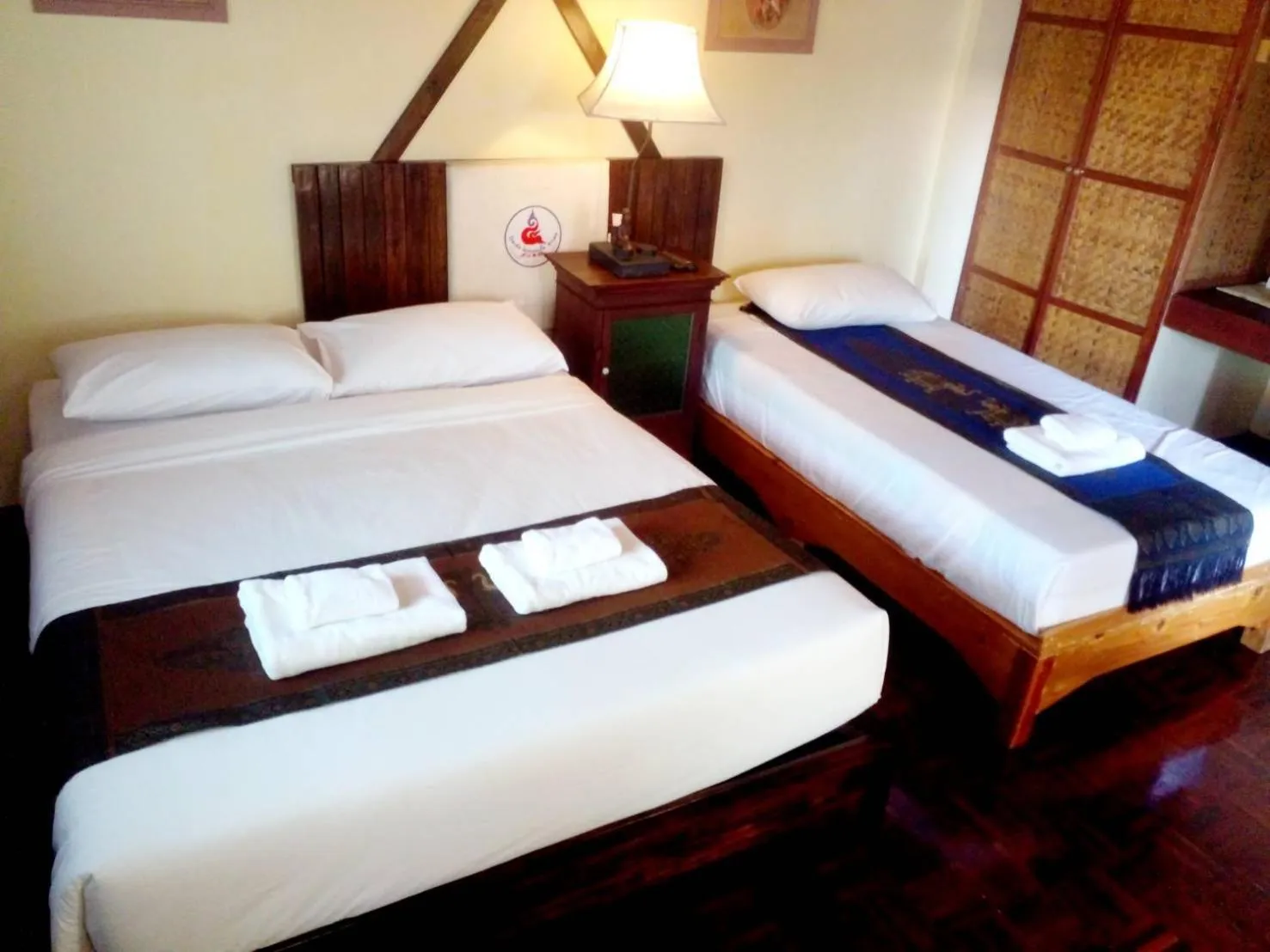 Bed in Golden Triangle Palace Hotel