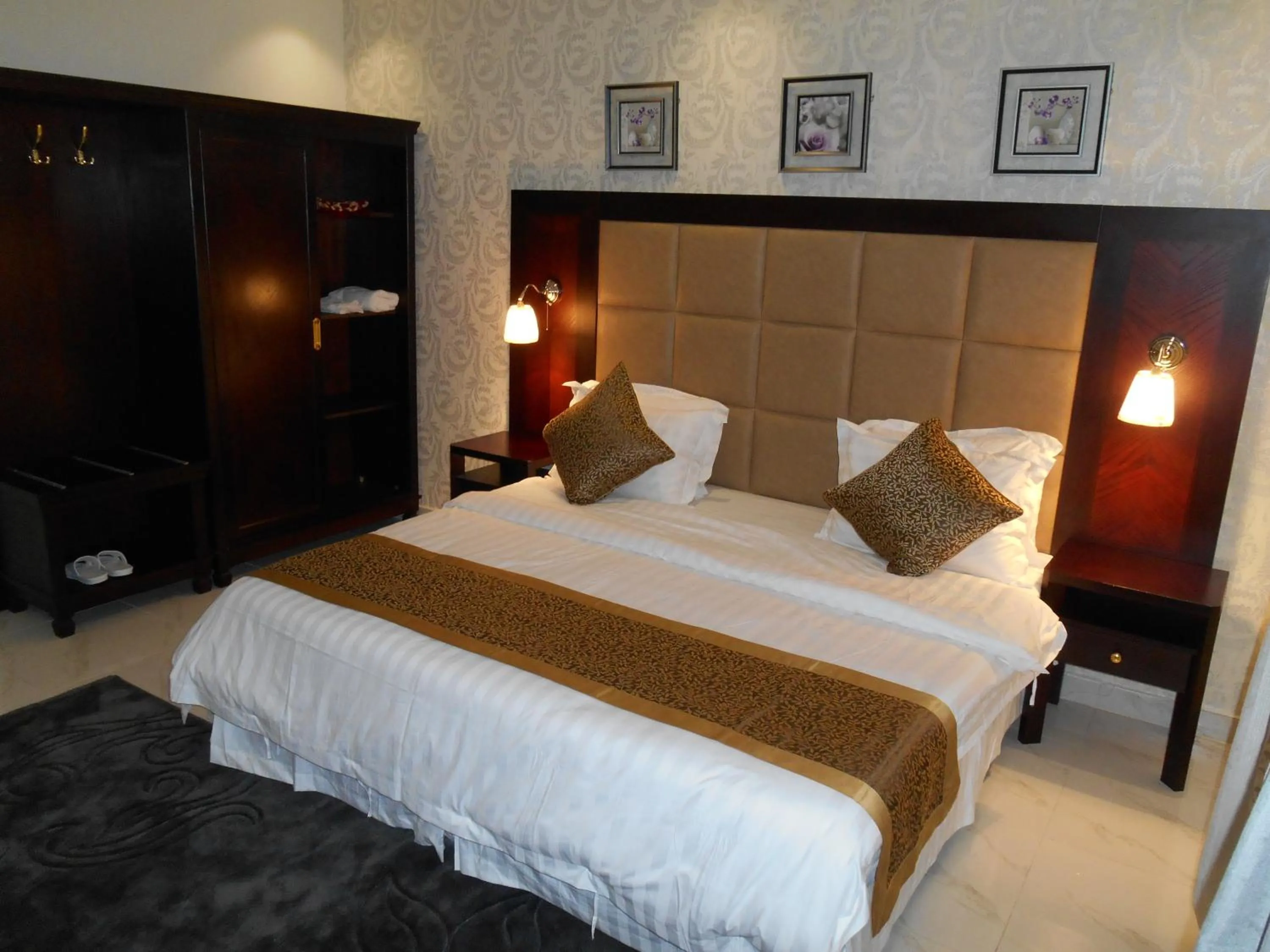 Bed in جلنار الشرق للشقق المخدومة