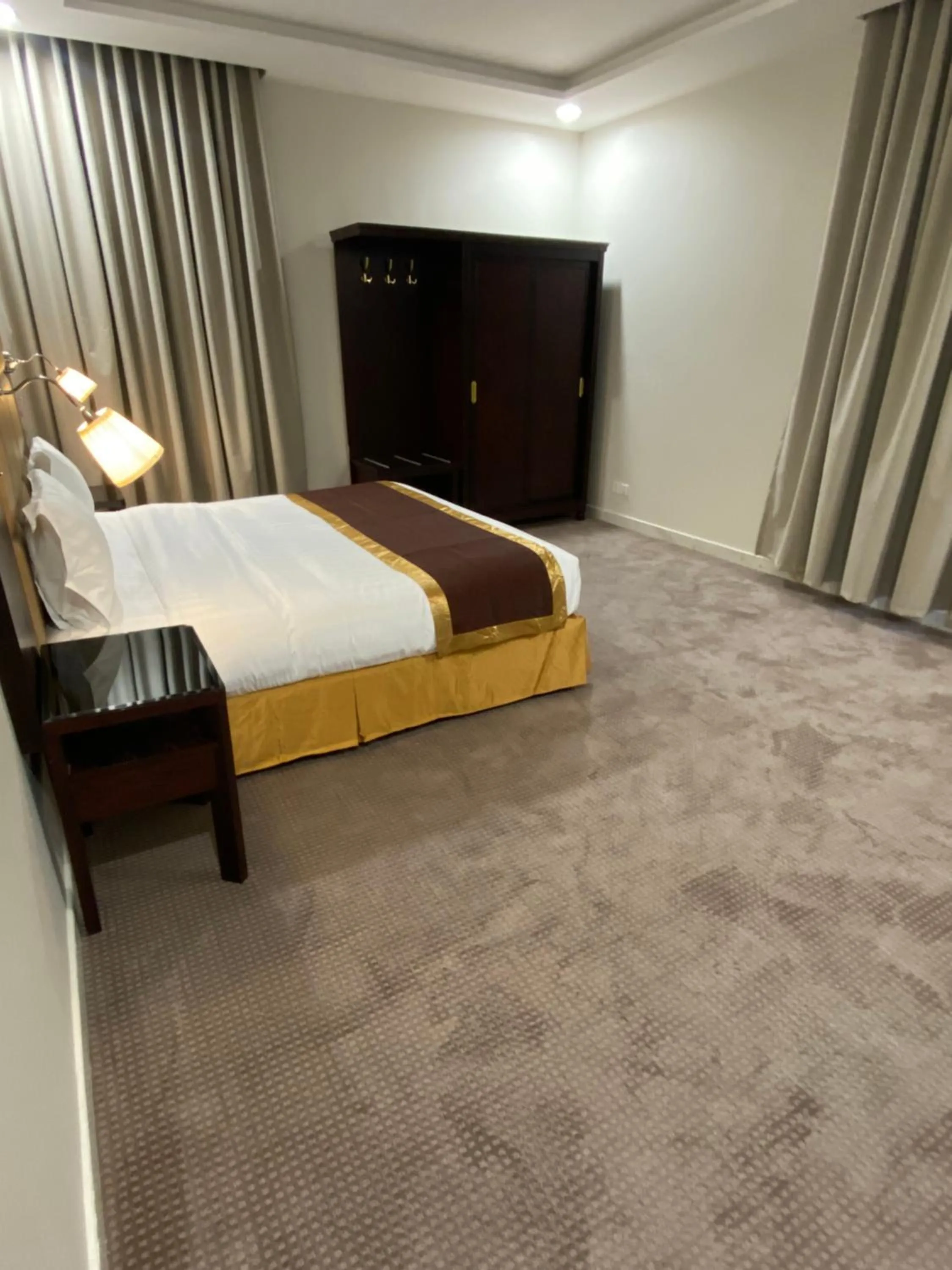 Bed in جلنار الشرق للشقق المخدومة