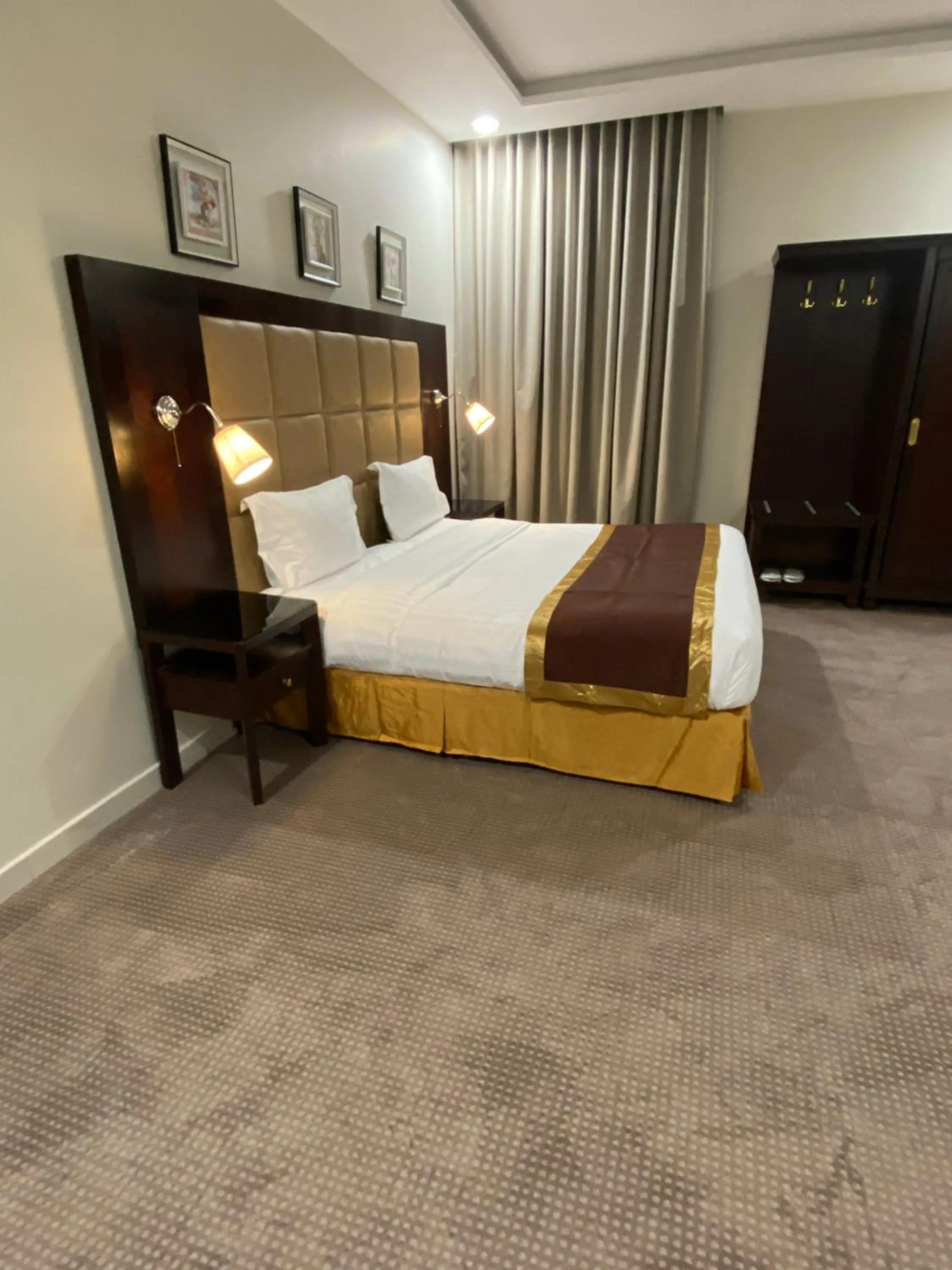 Bed in جلنار الشرق للشقق المخدومة