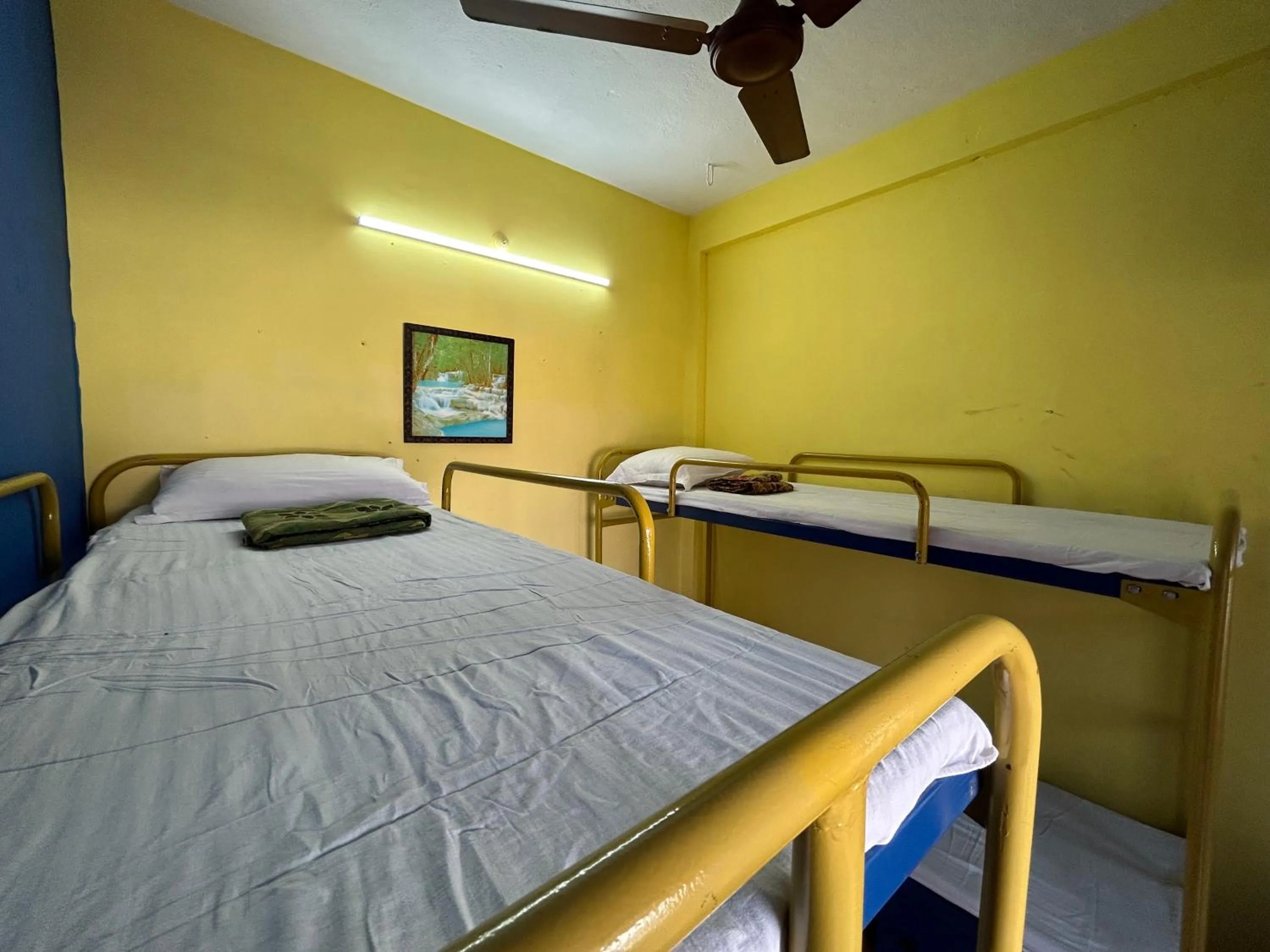 Bed in The Kaya Backpackers Rooms Srirangam