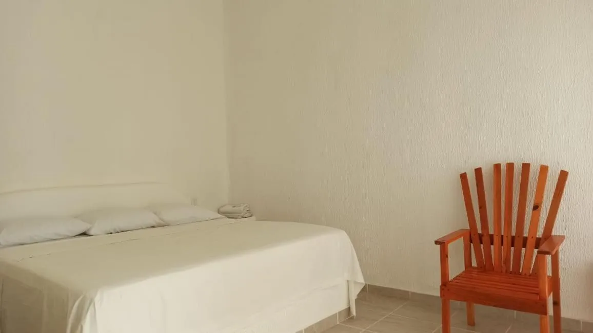 Bed in QUINTA DIAMANTE villas&hotel