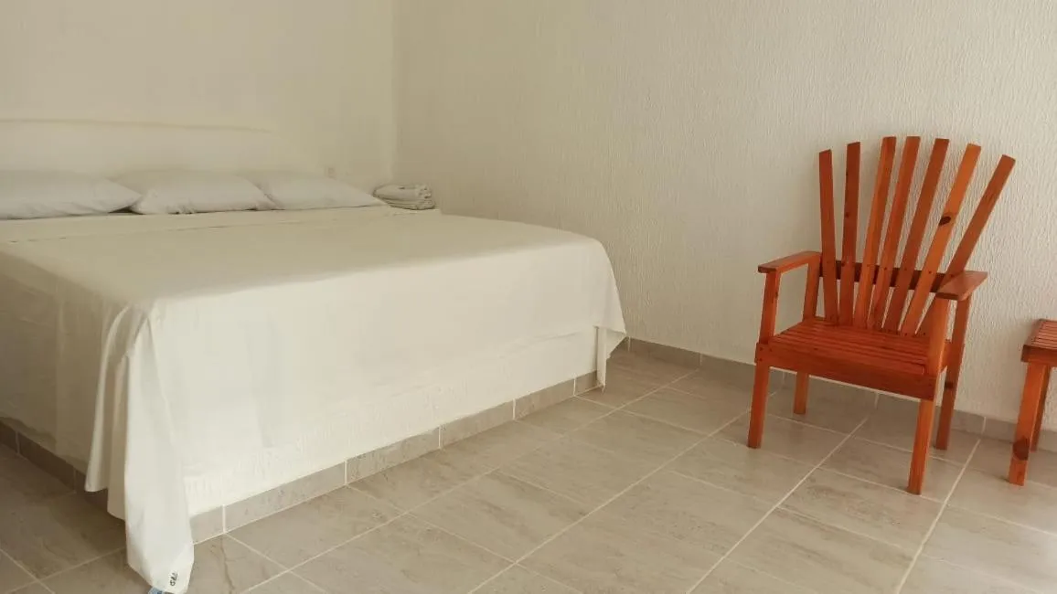 Bed in QUINTA DIAMANTE villas&hotel