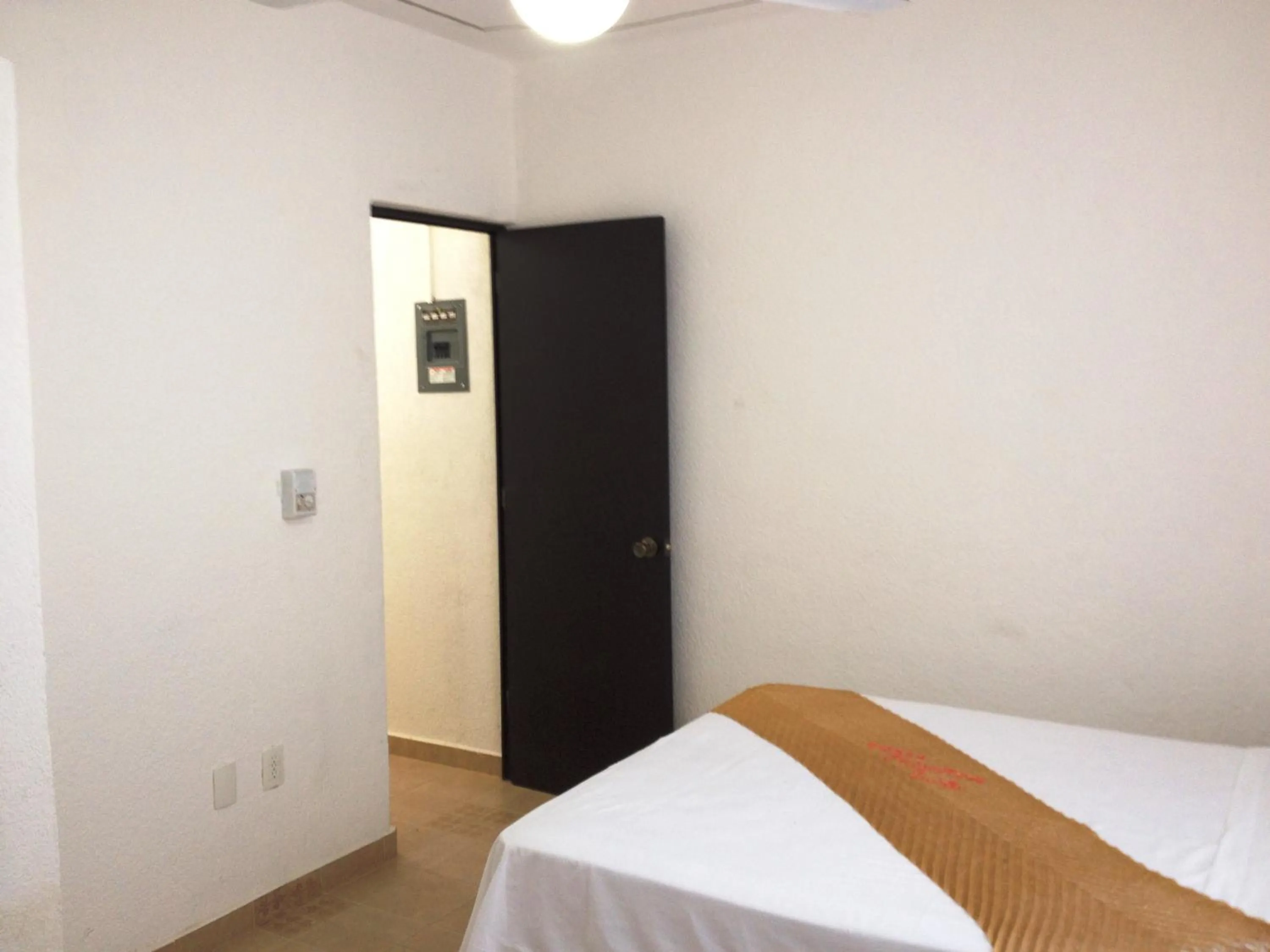 Bed in QUINTA DIAMANTE villas&hotel