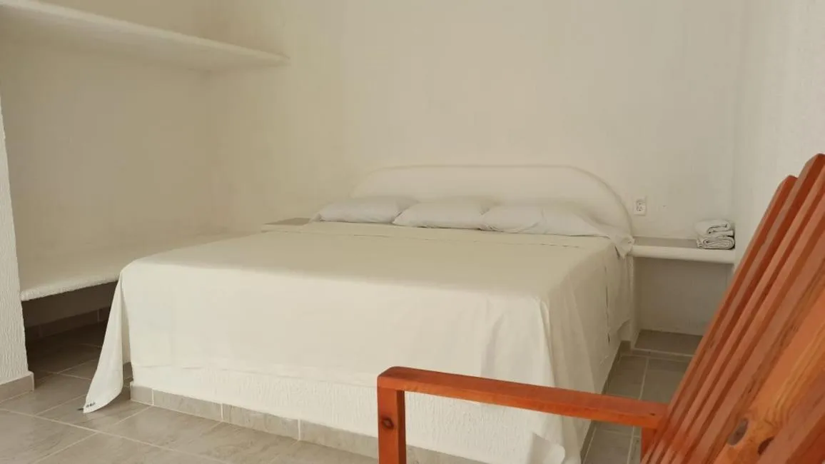 Bed in QUINTA DIAMANTE villas&hotel