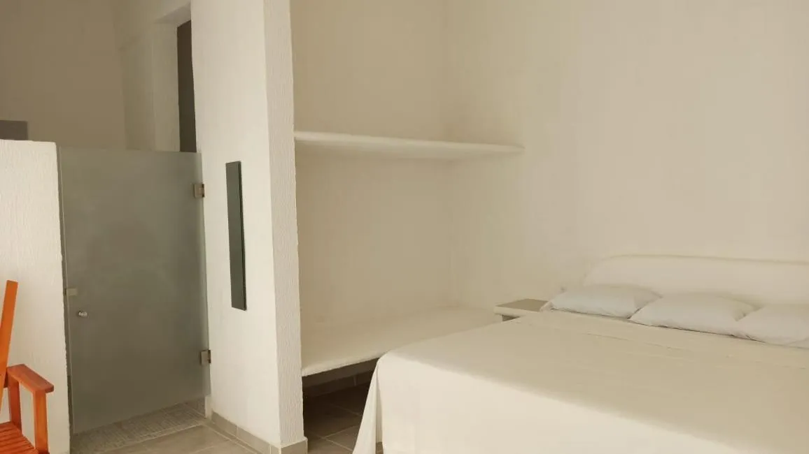 Bed in QUINTA DIAMANTE villas&hotel