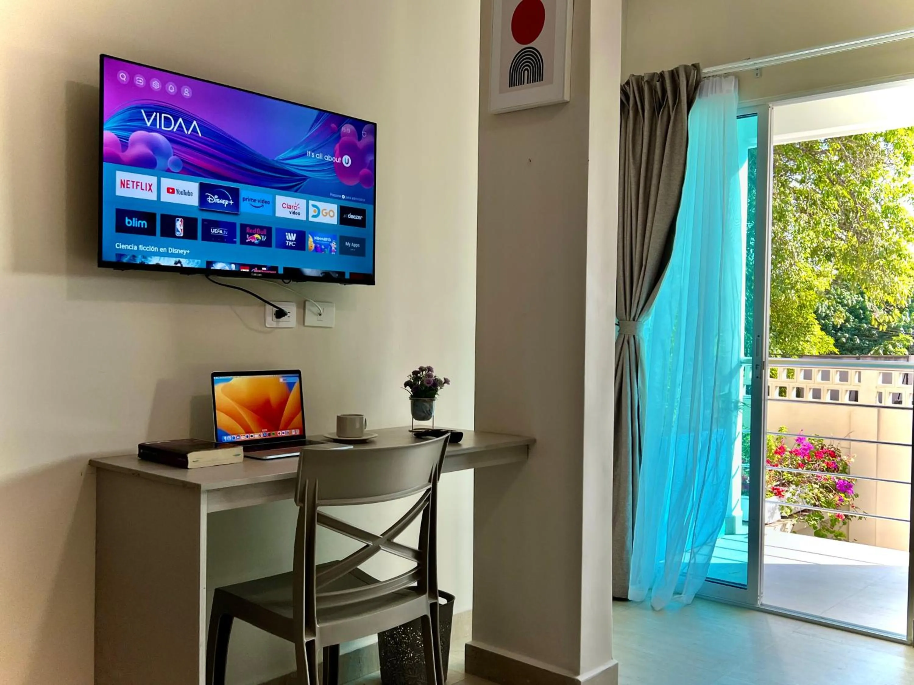 TV and multimedia in Charme 64 Hotel Boutique